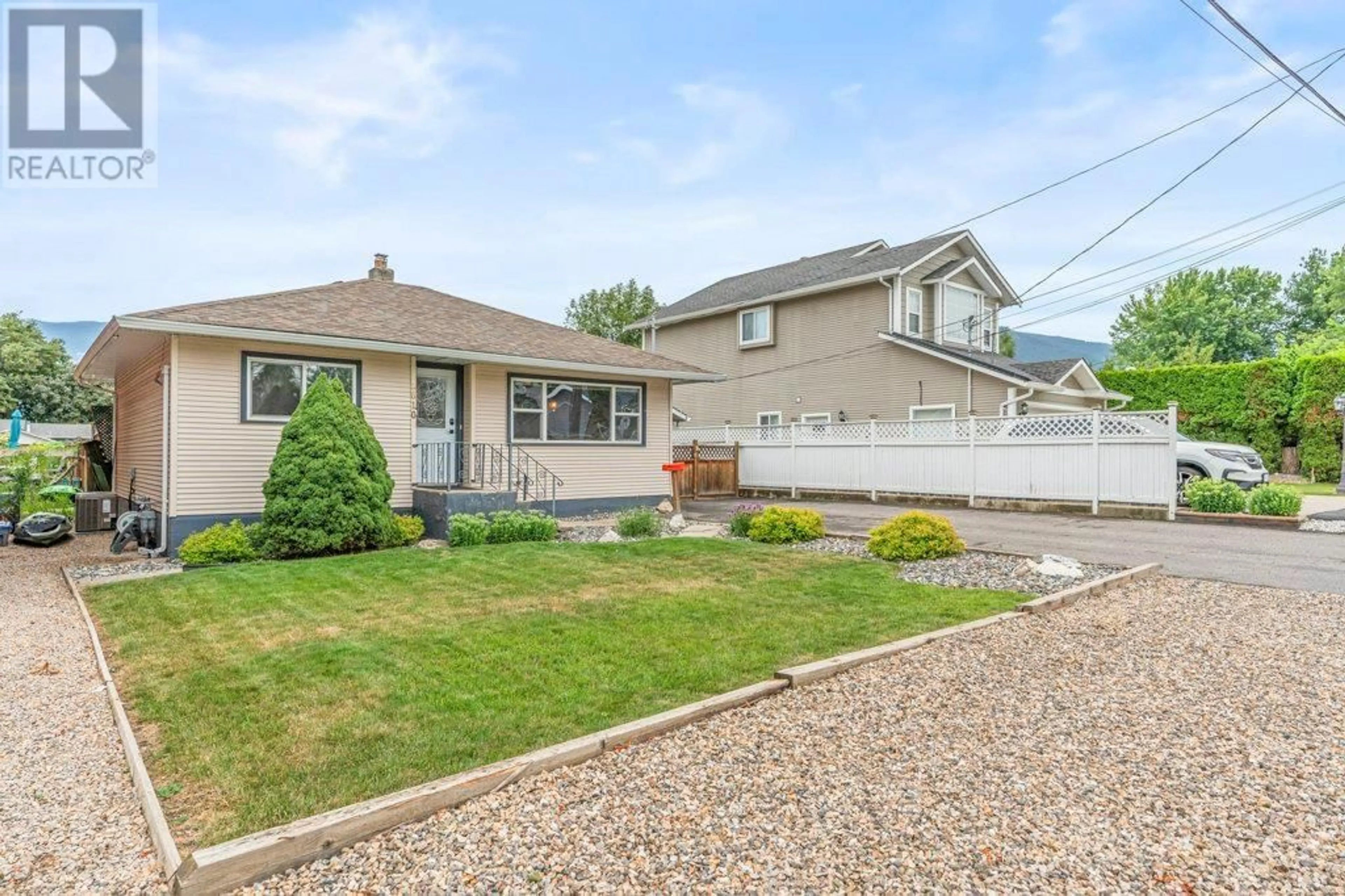 Home with vinyl exterior material, street for 2610 COLONY STREET, Armstrong British Columbia V0E1B2