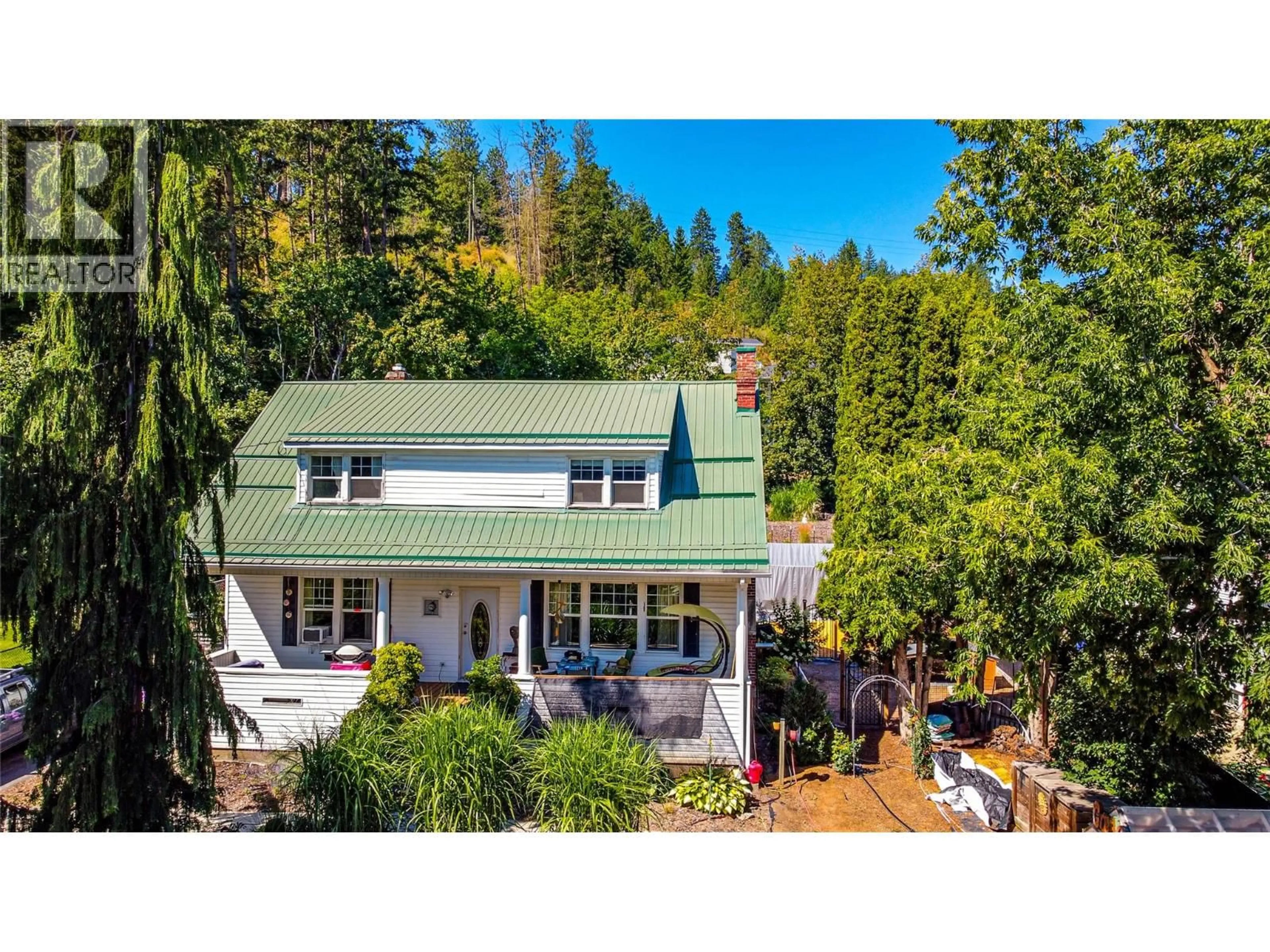 A pic from outside/outdoor area/front of a property/back of a property/a pic from drone, unknown for 706 SICAMOUS STREET, Enderby British Columbia V0E1V0