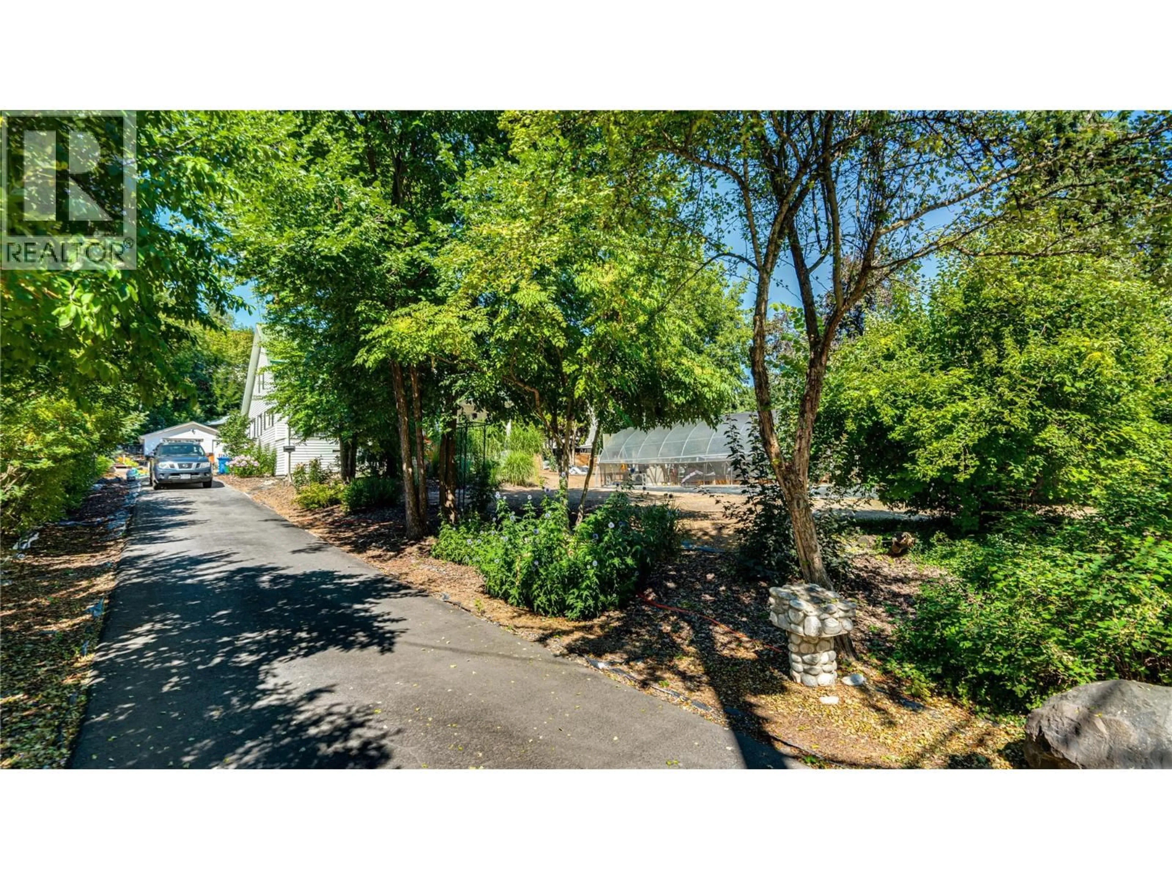 A pic from outside/outdoor area/front of a property/back of a property/a pic from drone, street for 706 SICAMOUS STREET, Enderby British Columbia V0E1V0