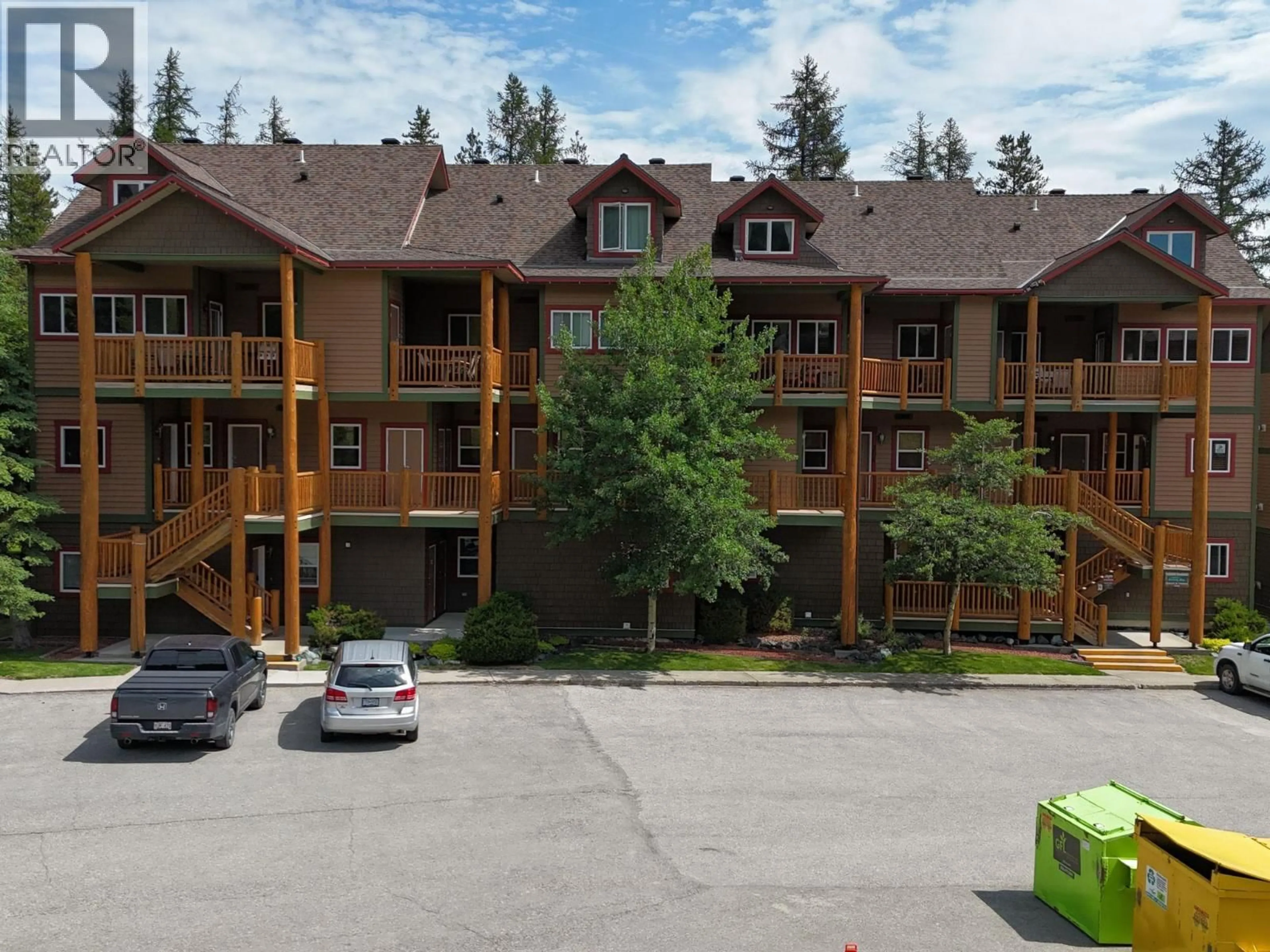A pic from outside/outdoor area/front of a property/back of a property/a pic from drone, mountain view for 312 - 300 STEMWINDER DRIVE, Kimberley British Columbia V1A3E9