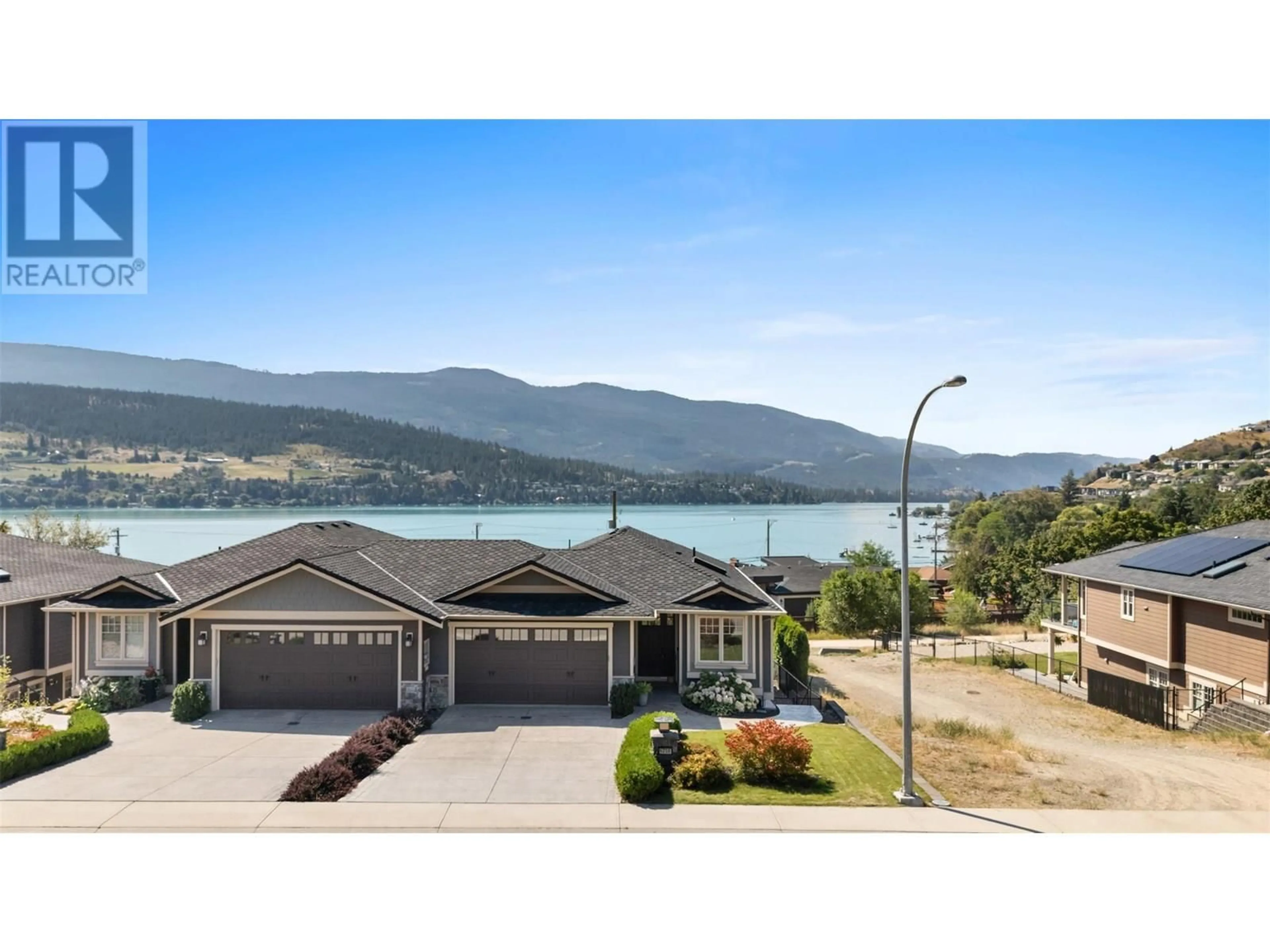 A pic from outside/outdoor area/front of a property/back of a property/a pic from drone, water/lake/river/ocean view for 8758 HOFER DRIVE, Coldstream British Columbia V1B1Y8