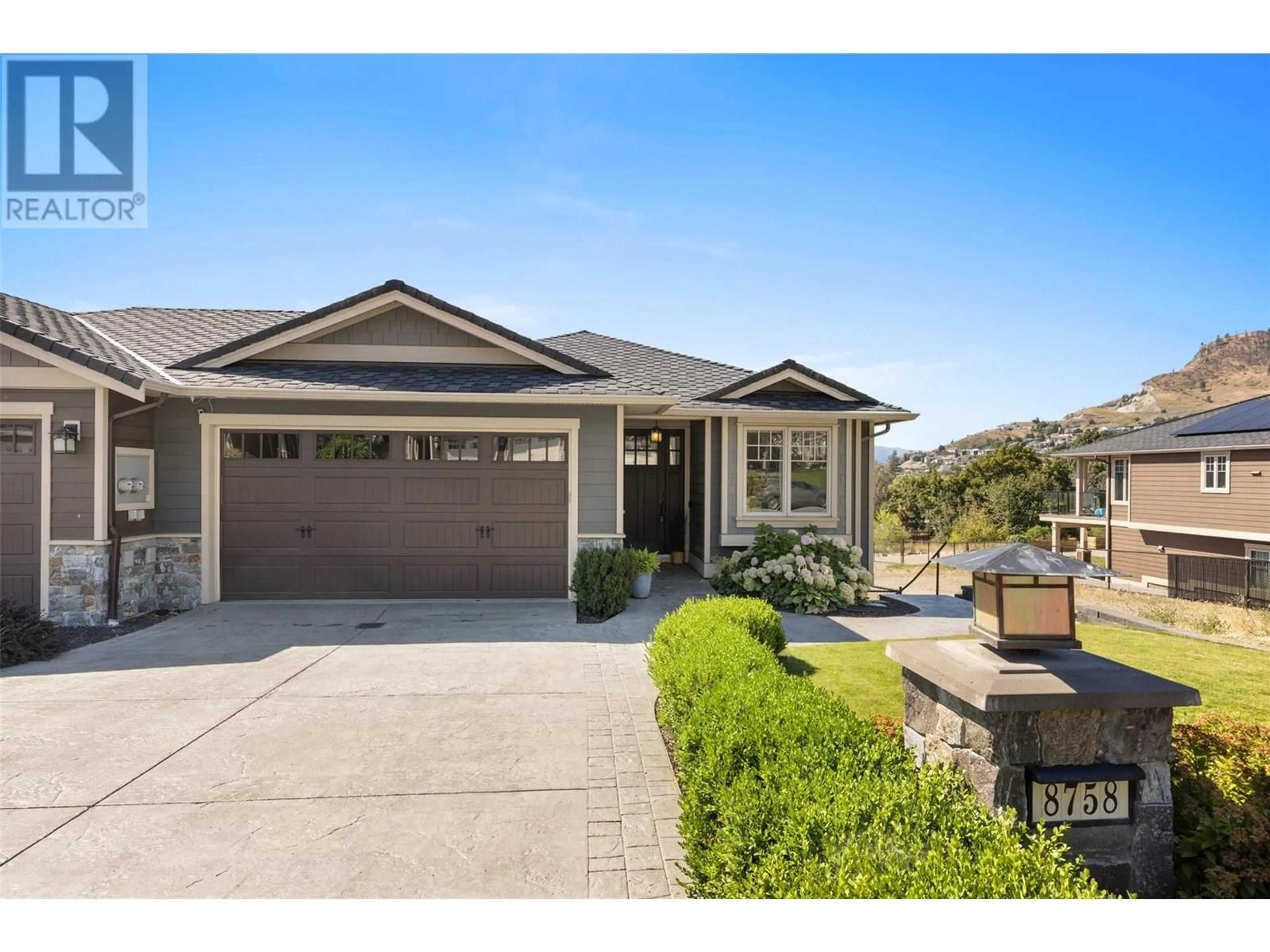 Home with vinyl exterior material, street for 8758 HOFER DRIVE, Coldstream British Columbia V1B1Y8