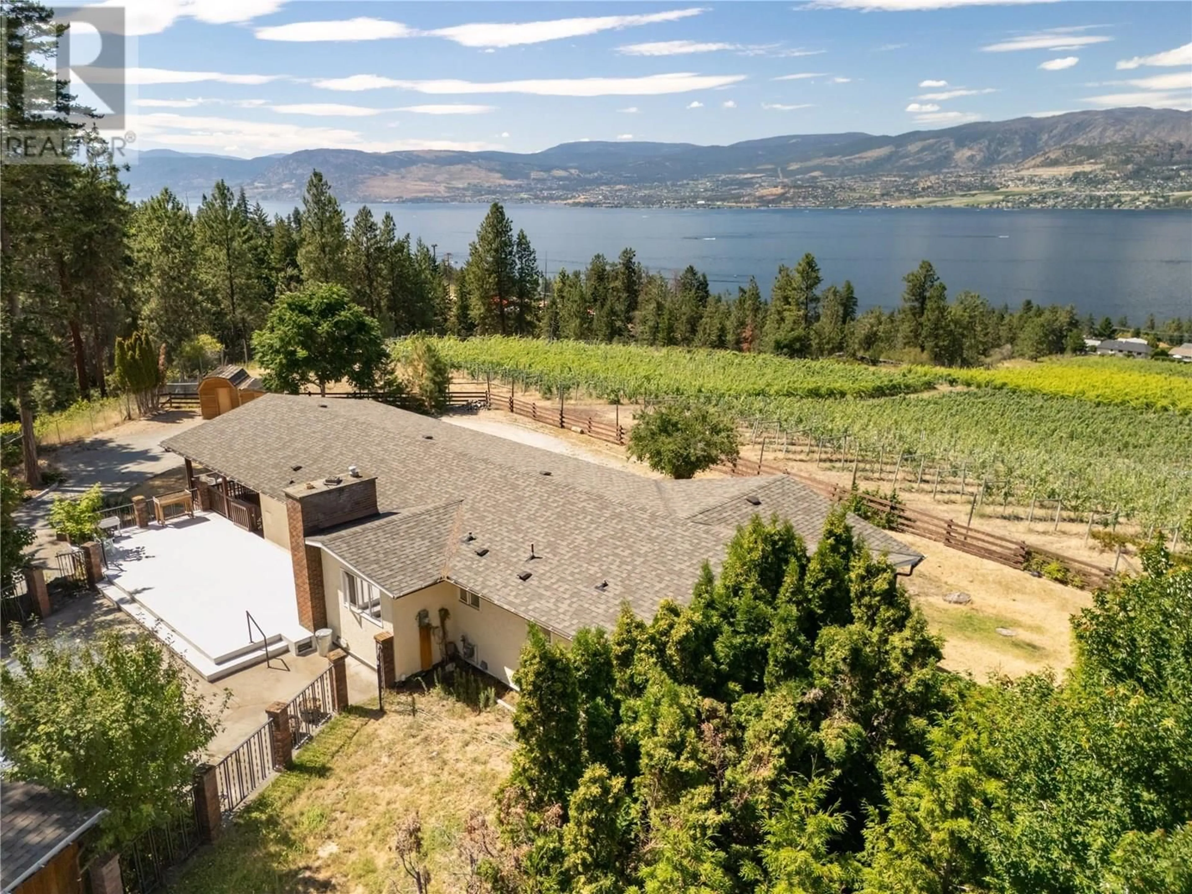 A pic from outside/outdoor area/front of a property/back of a property/a pic from drone, water/lake/river/ocean view for 482 OKAVIEW ROAD, Kelowna British Columbia V1W4M1