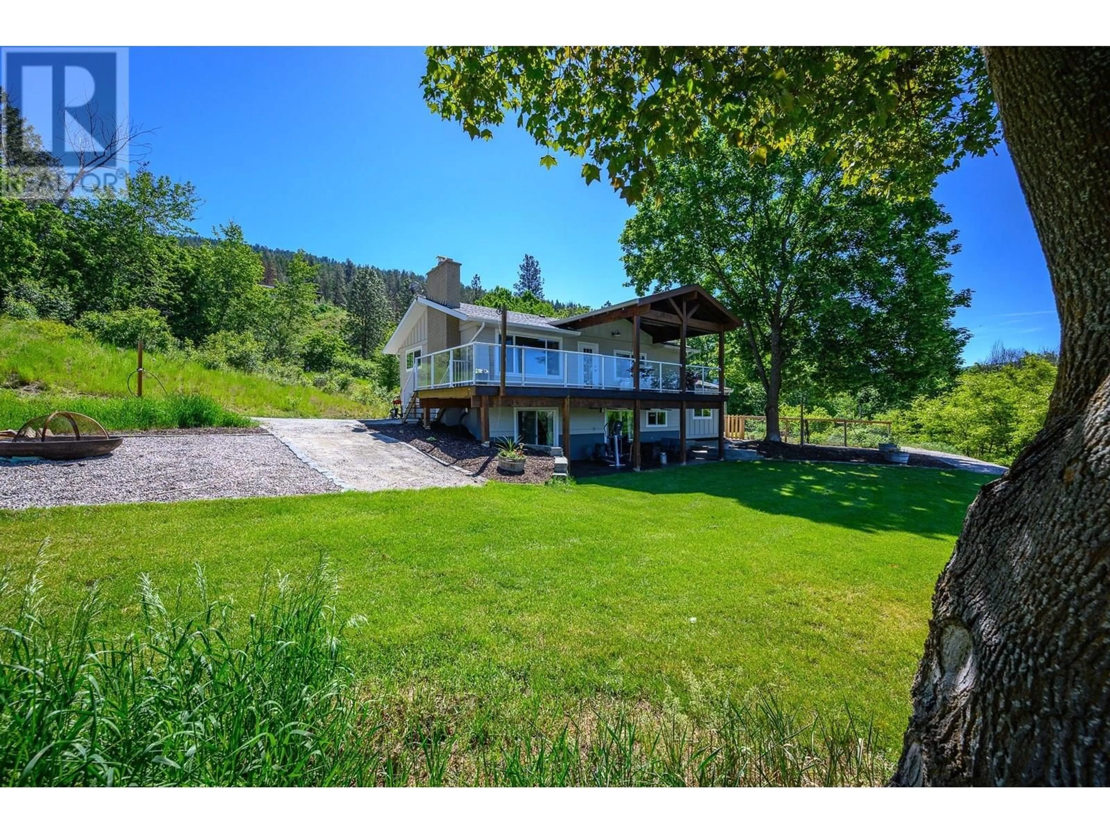 A pic from outside/outdoor area/front of a property/back of a property/a pic from drone, water/lake/river/ocean view for 3253 PHILLIPS ROAD, Vernon British Columbia V1B3H6