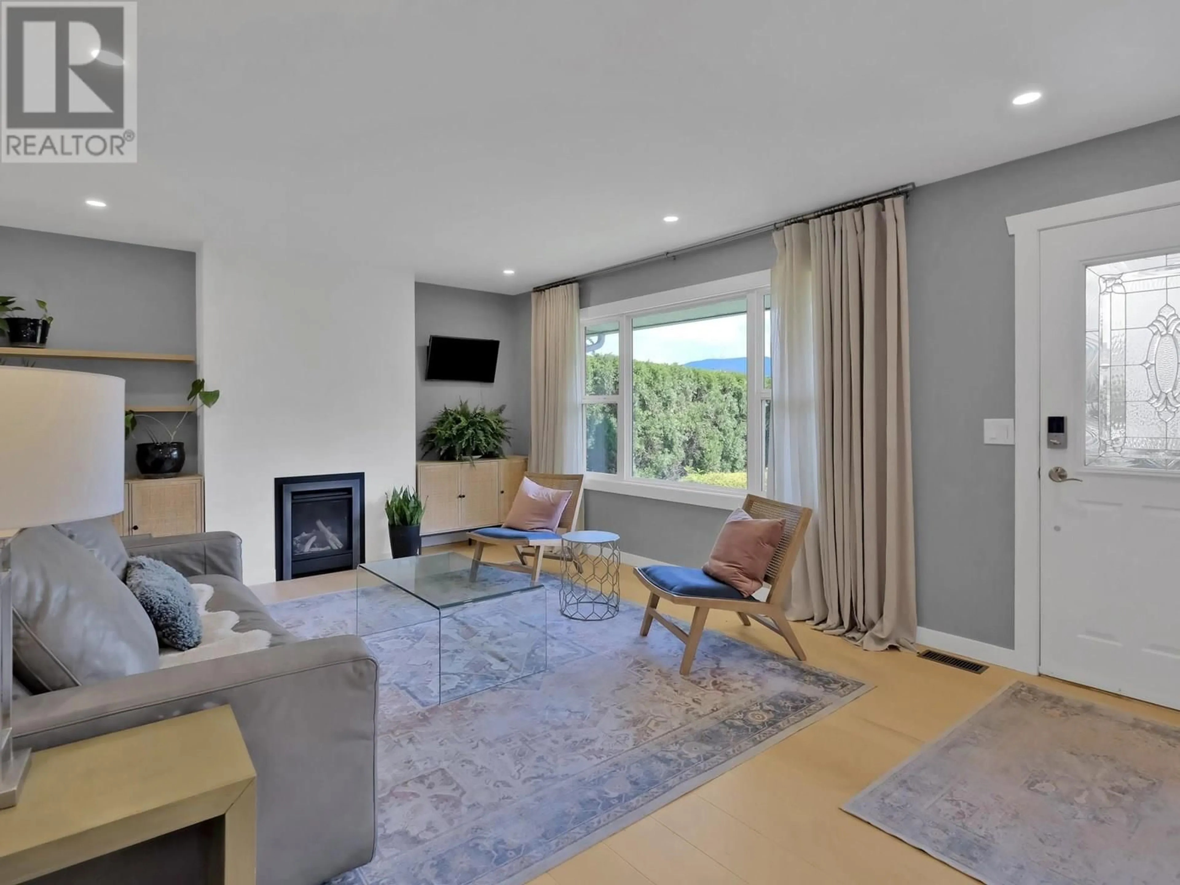 Living room with furniture, unknown for 12412 VICTORIA ROAD, Summerland British Columbia V0H1Z2