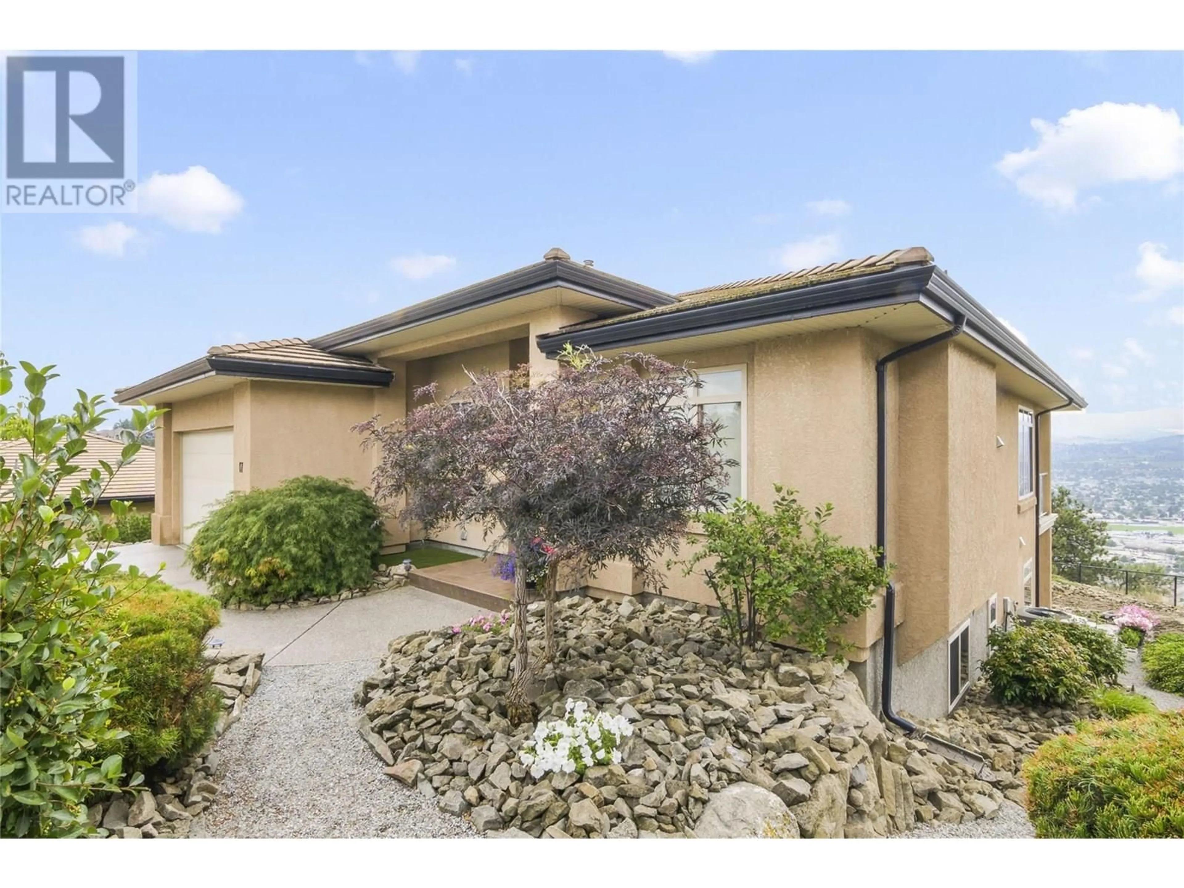 A pic from outside/outdoor area/front of a property/back of a property/a pic from drone, street for 17 - 2213 WADDINGTON COURT, Kelowna British Columbia V1V2M8