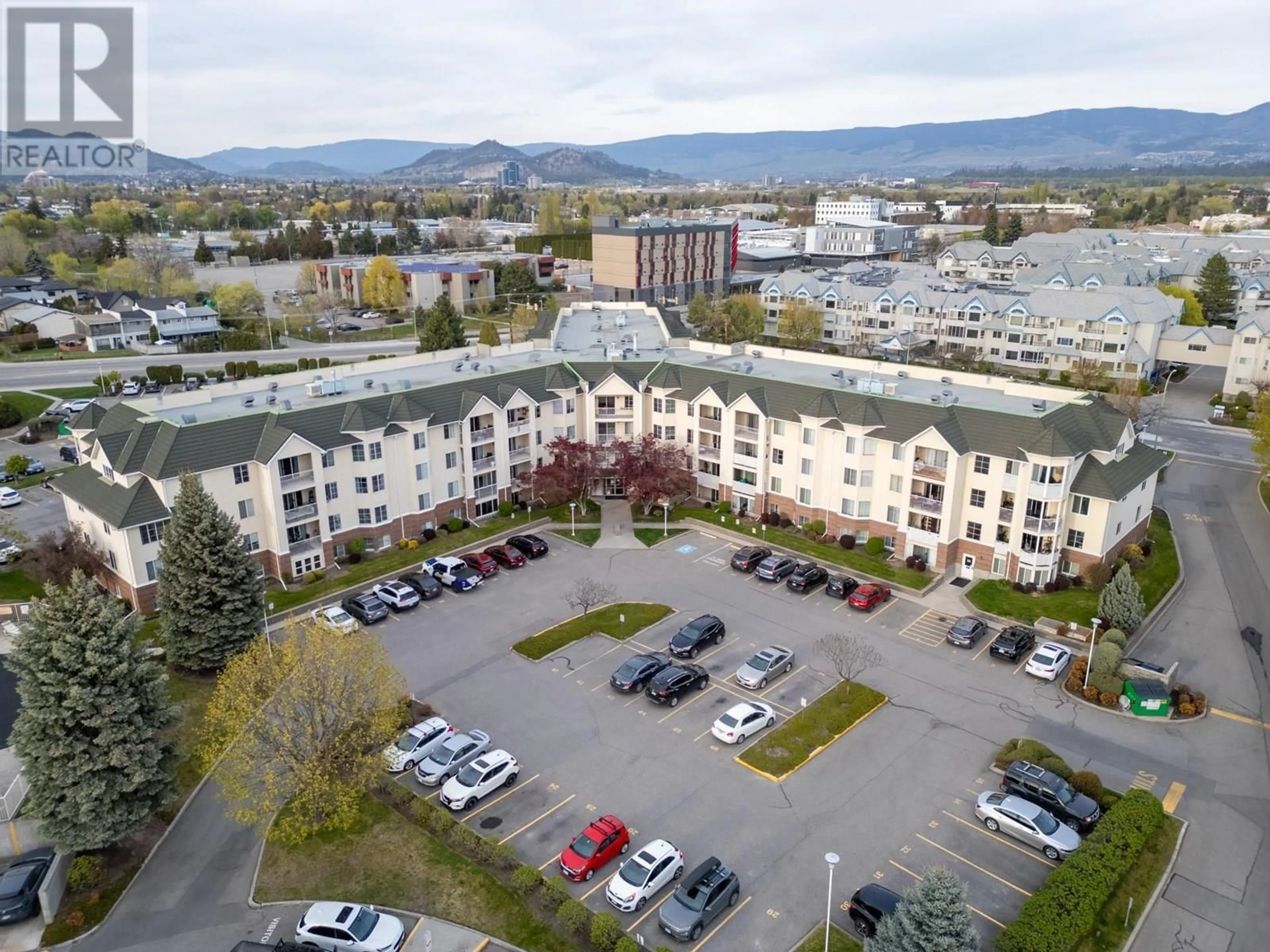 A pic from outside/outdoor area/front of a property/back of a property/a pic from drone, mountain view for 116 - 3160 CASORSO ROAD, Kelowna British Columbia V1W3L7