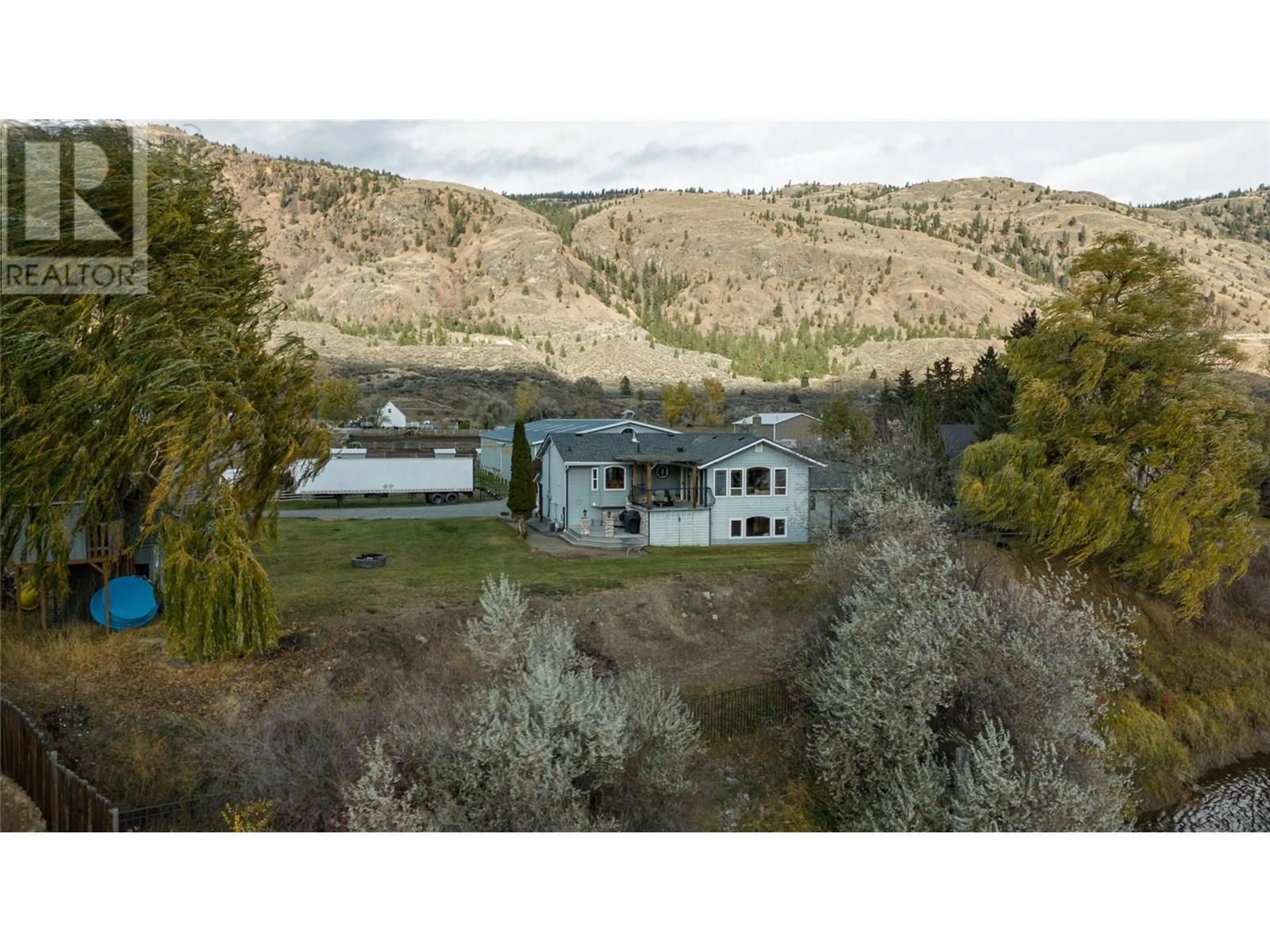A pic from outside/outdoor area/front of a property/back of a property/a pic from drone, mountain view for 392 TEAL ROAD, Kamloops British Columbia V2H1S5