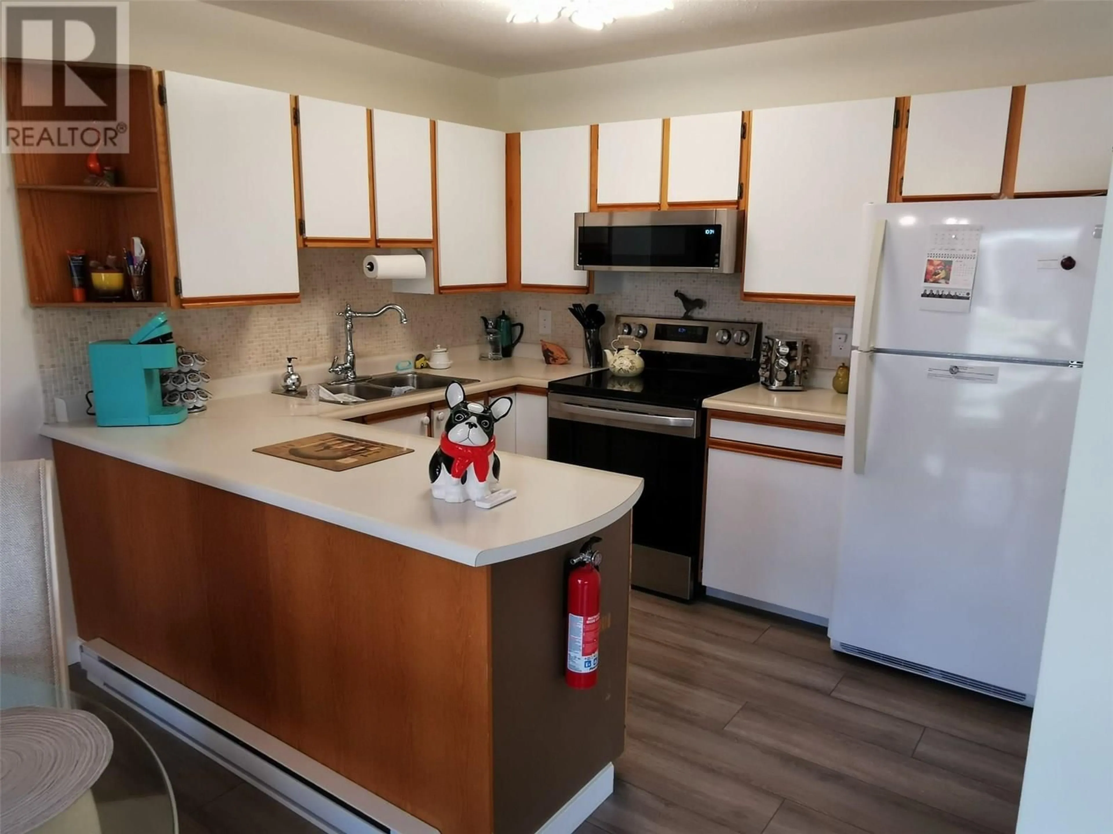 Standard kitchen, wood/laminate floor for 11 - 13620 VICTORIA ROAD NORTH, Summerland British Columbia V0H1Z0