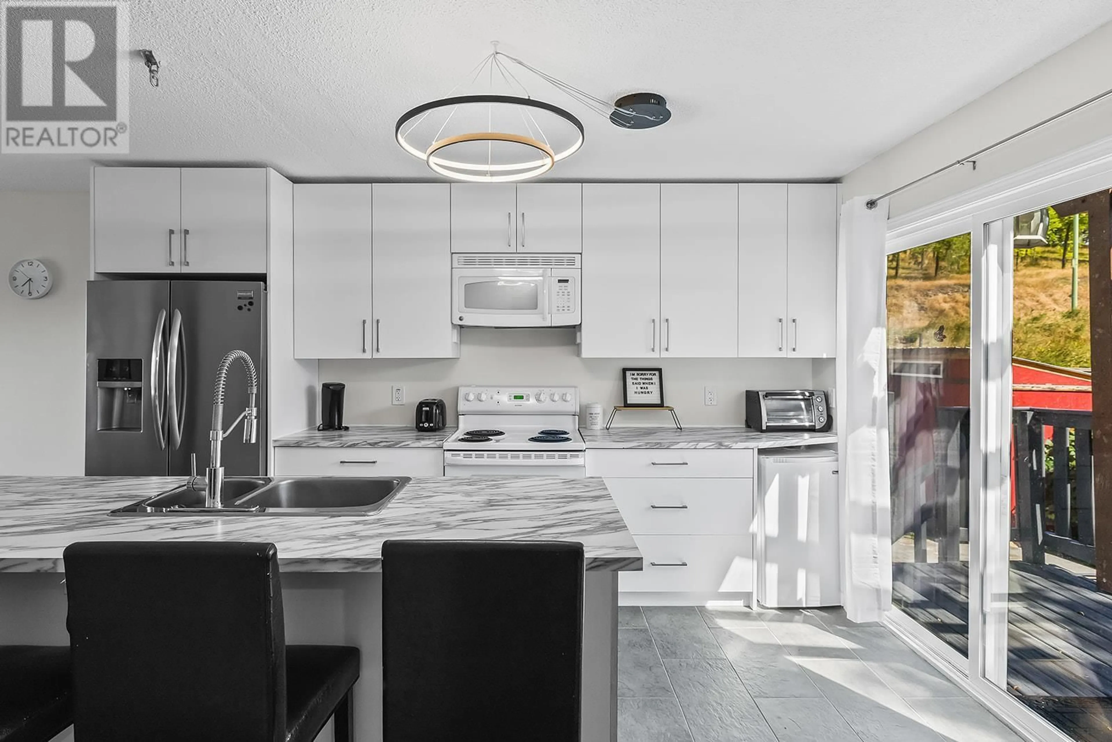 Contemporary kitchen, ceramic/tile floor for 675 WEBSTER ROAD, Kelowna British Columbia V1X4V6