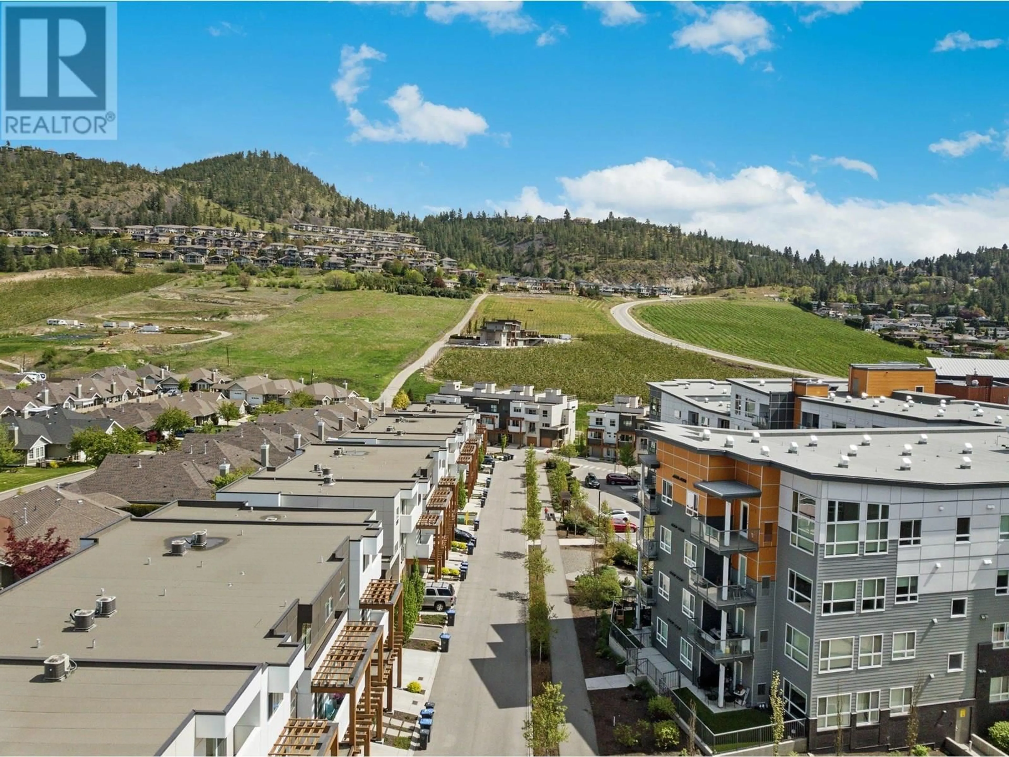 A pic from outside/outdoor area/front of a property/back of a property/a pic from drone, mountain view for 47 - 720 VALLEY ROAD, Kelowna British Columbia V1V0E1