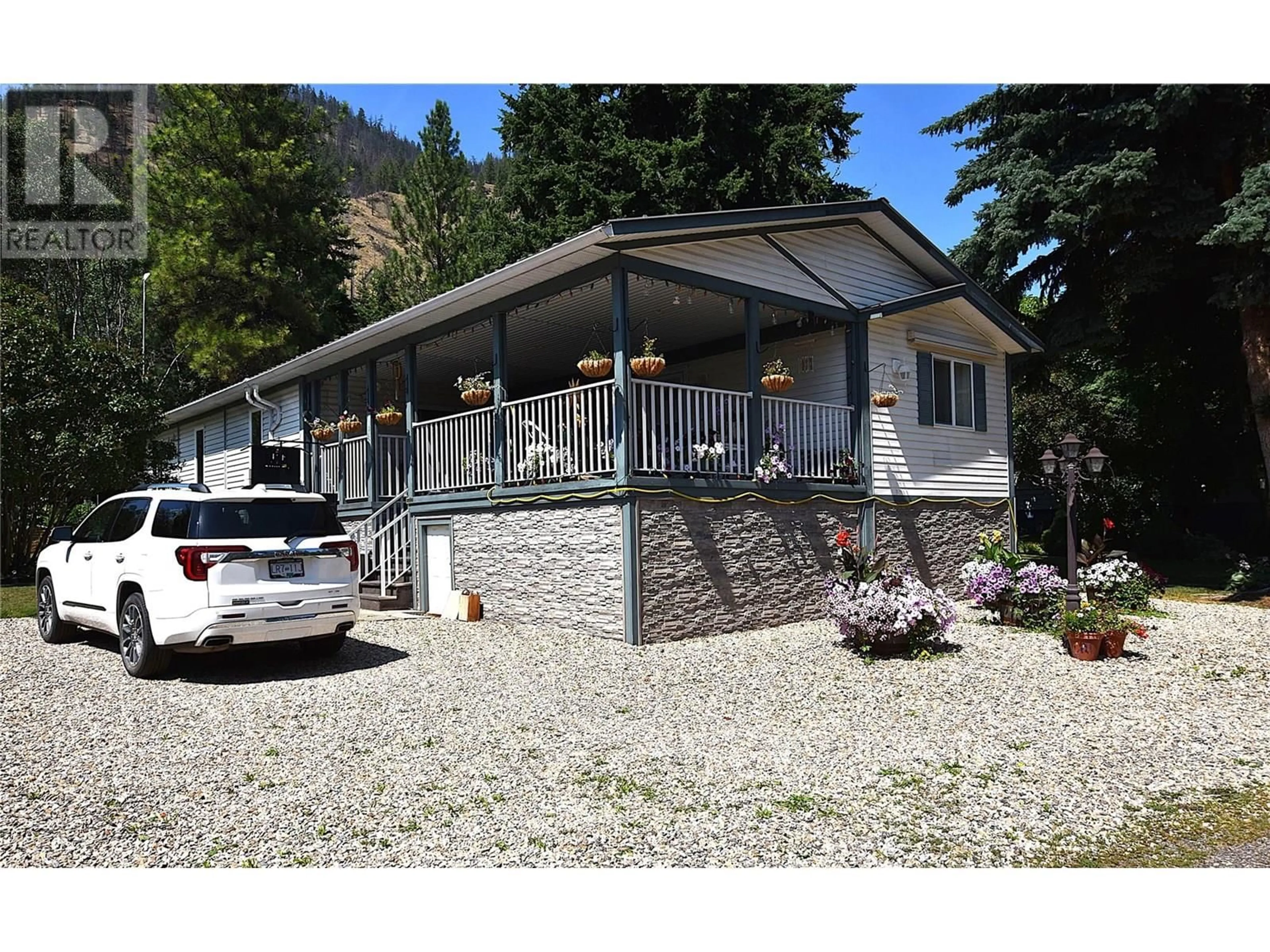 Home with vinyl exterior material, street for 18 - 12069 WESTSIDE ROAD, Vernon British Columbia V1H2A5