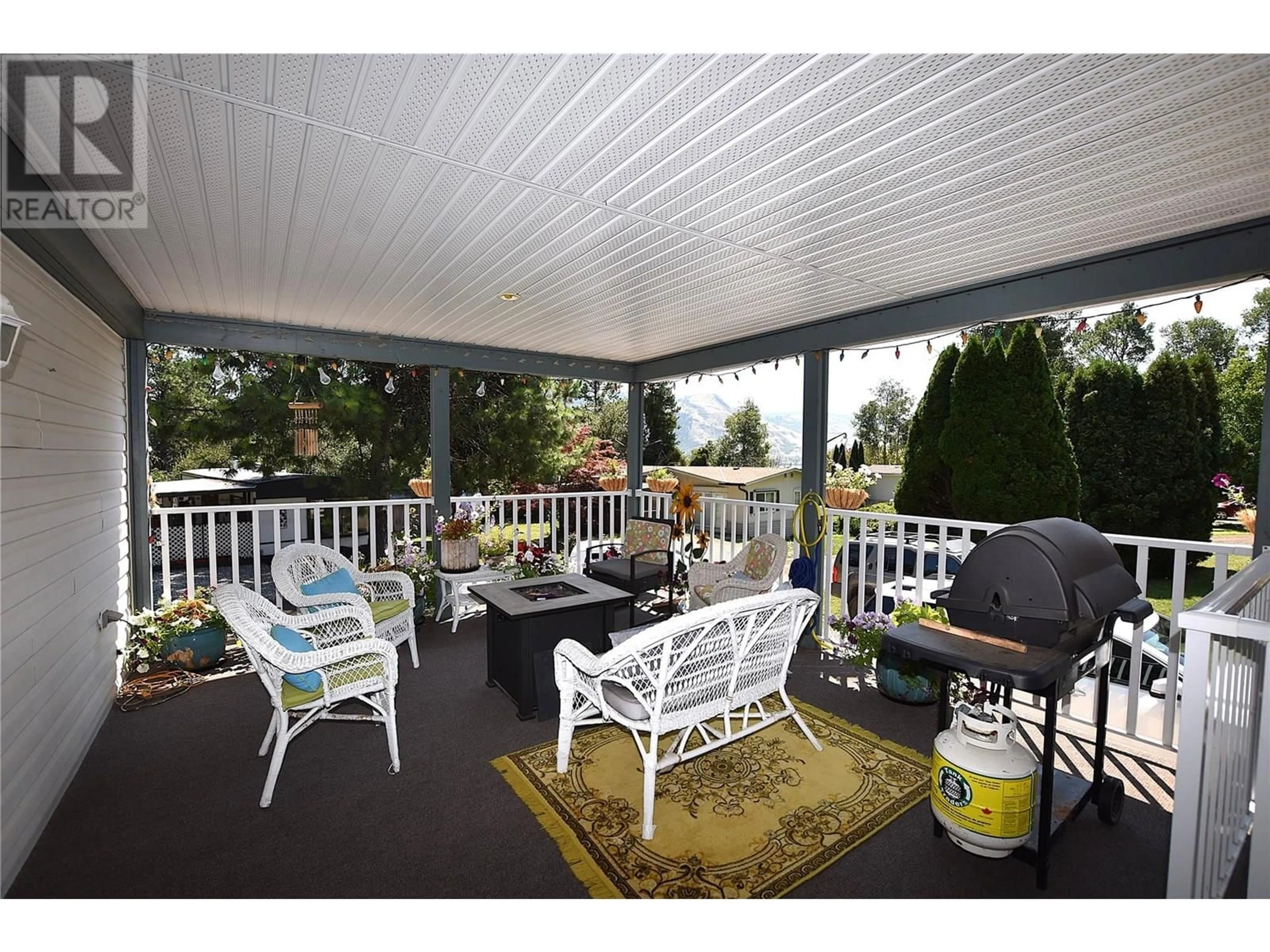 Patio, water/lake/river/ocean view for 18 - 12069 WESTSIDE ROAD, Vernon British Columbia V1H2A5