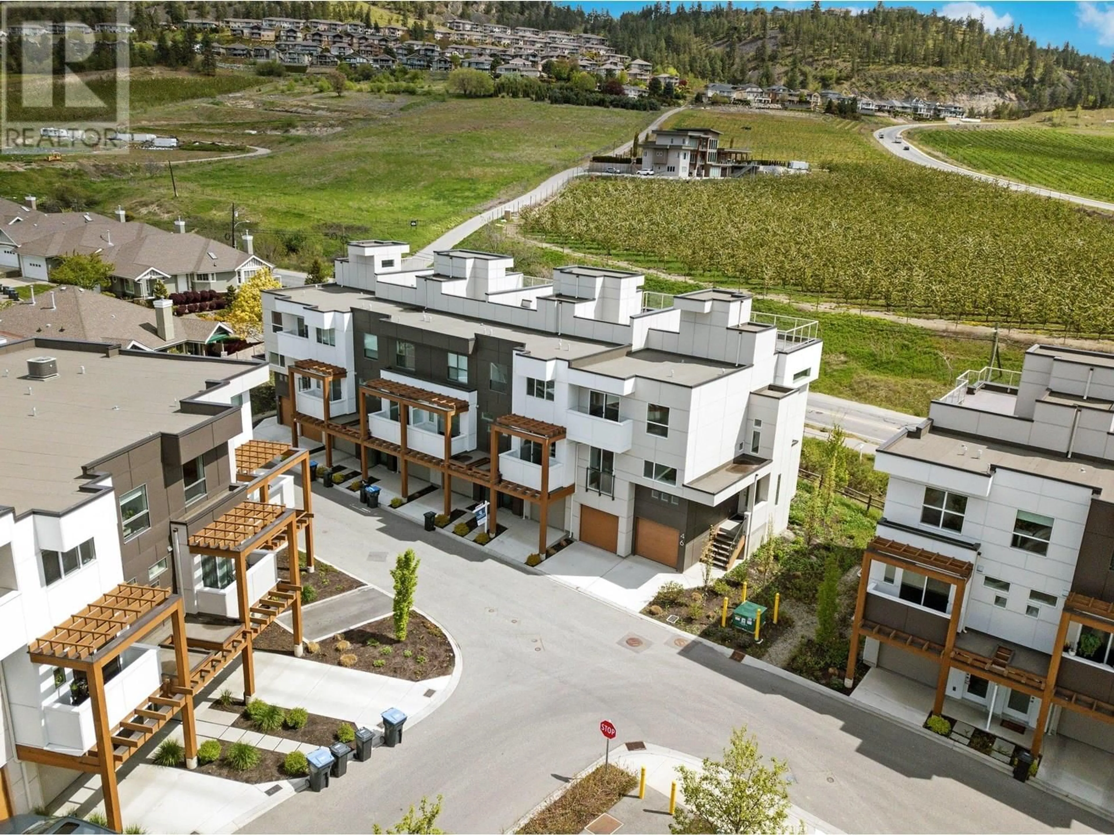 A pic from outside/outdoor area/front of a property/back of a property/a pic from drone, mountain view for 49 - 720 VALLEY ROAD, Kelowna British Columbia V1V2E6