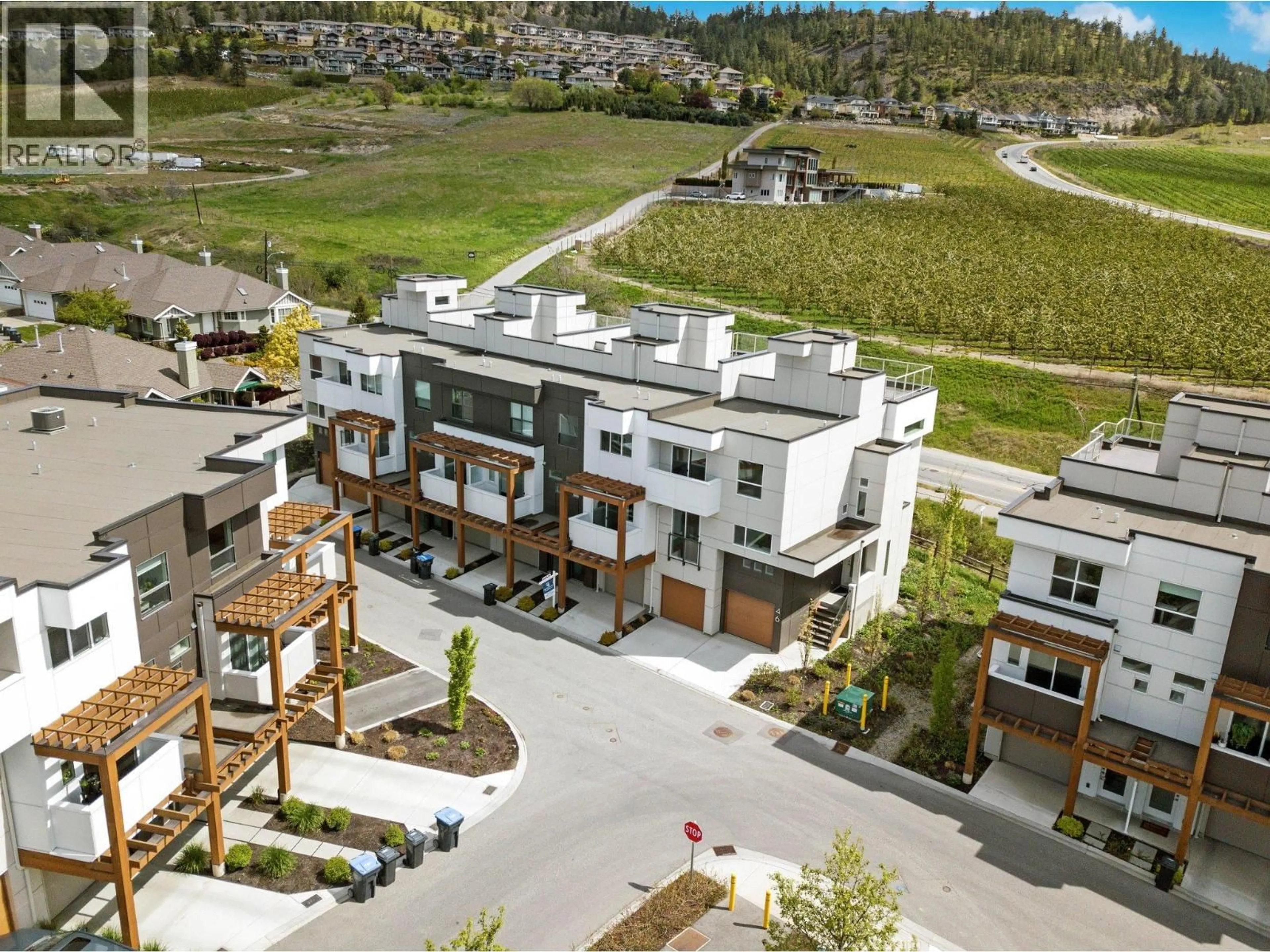 A pic from outside/outdoor area/front of a property/back of a property/a pic from drone, mountain view for 41 - 720 VALLEY ROAD, Kelowna British Columbia V1V2E6