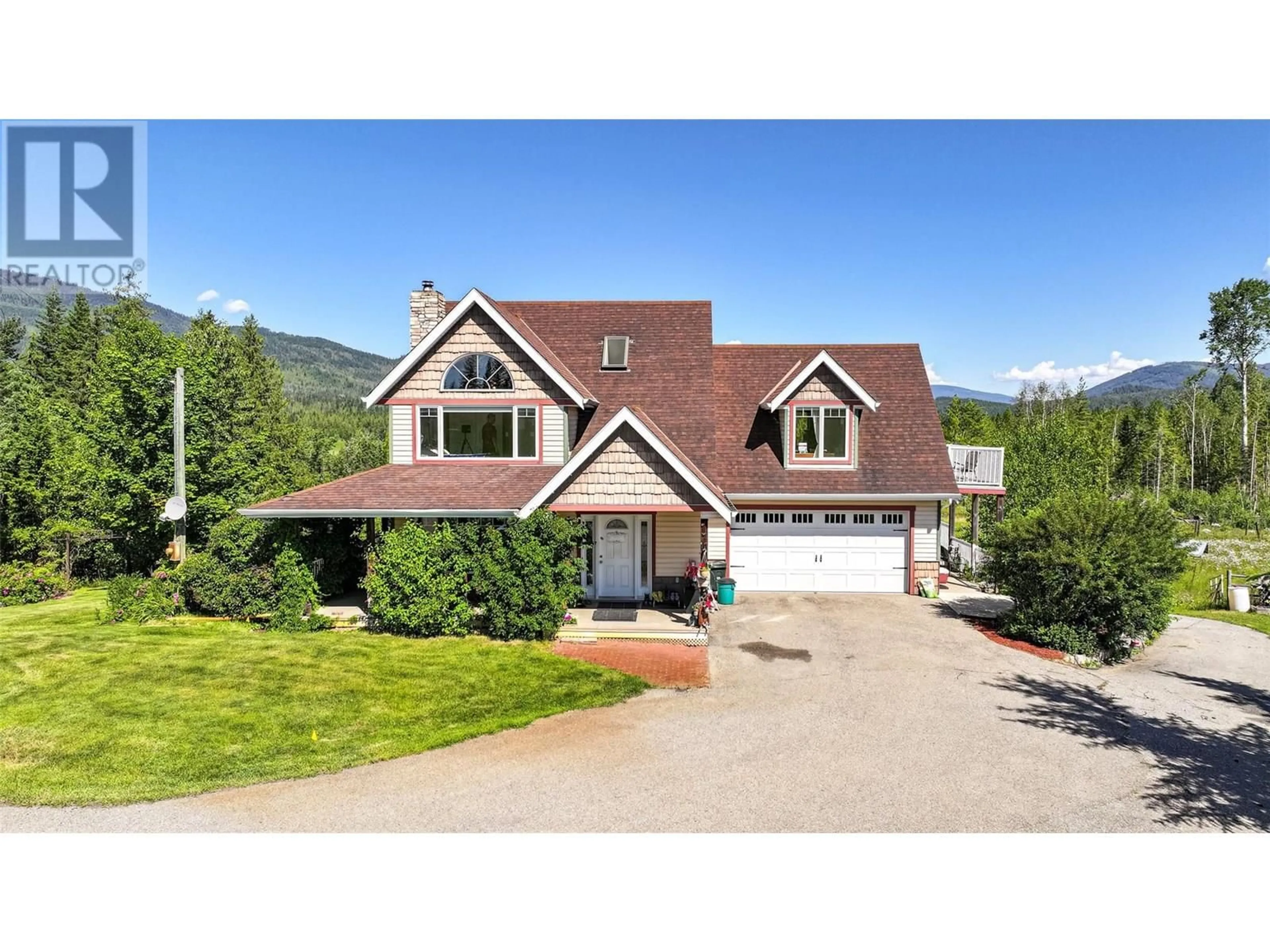 Home with vinyl exterior material, mountain view for 9255 FIREHALL FRONTAGE ROAD, Salmon Arm British Columbia V1E2X6