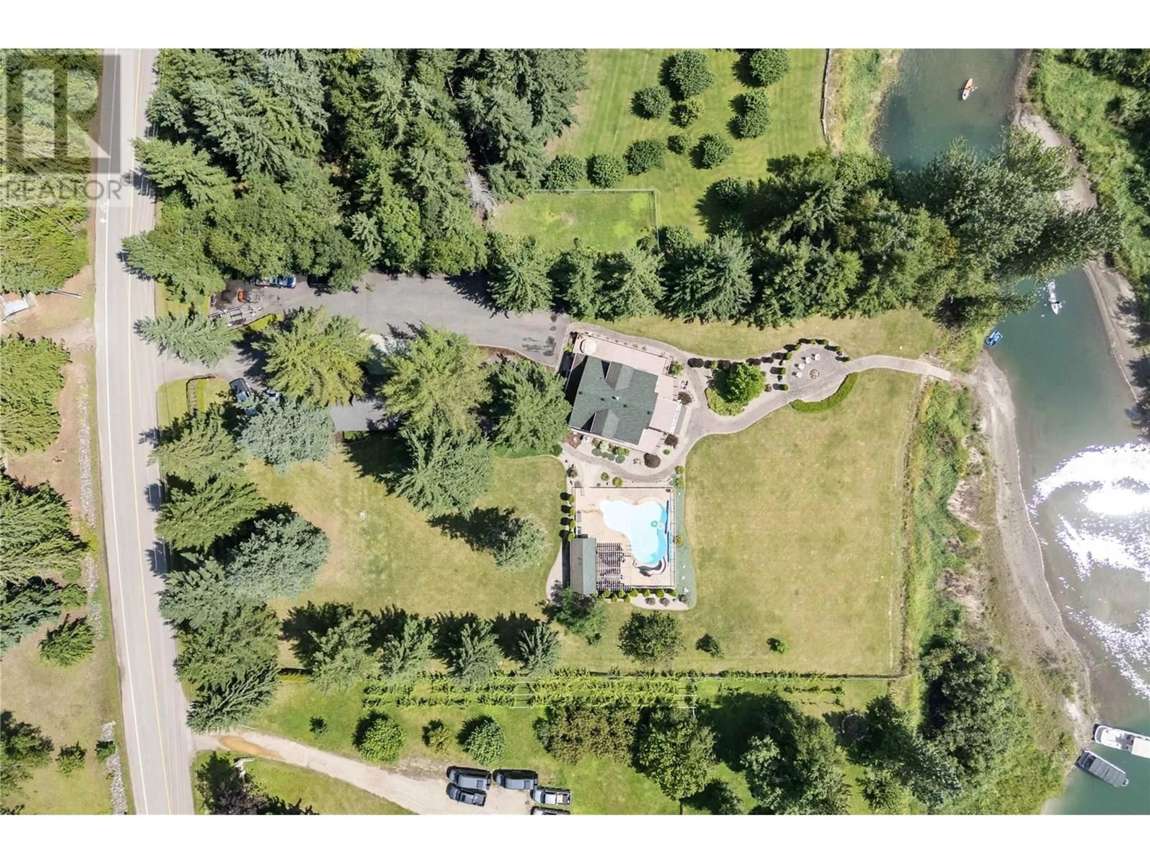 A pic from outside/outdoor area/front of a property/back of a property/a pic from drone, unknown for 33 OLD TOWN ROAD, Sicamous British Columbia V0E2V4