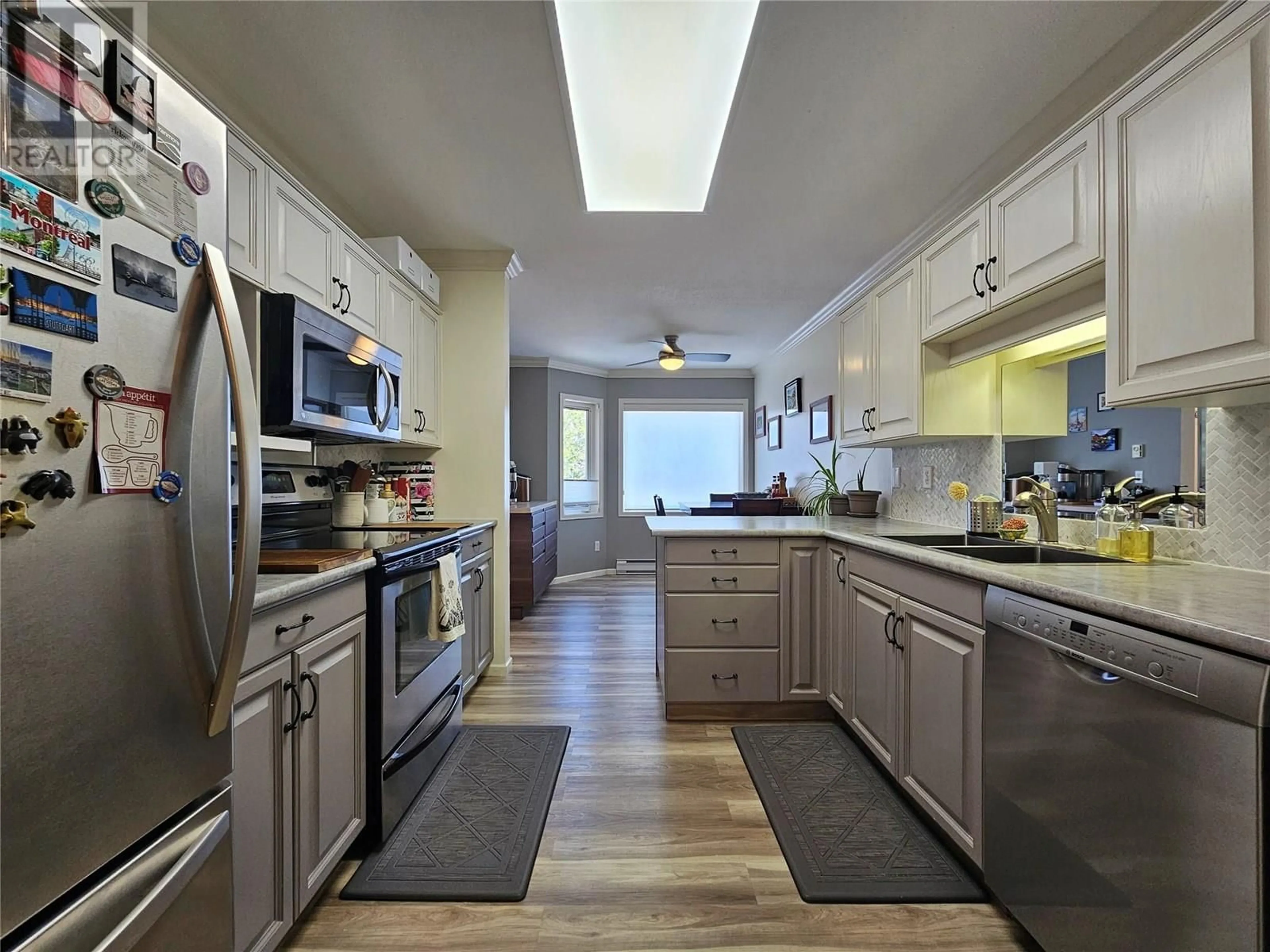 Open concept kitchen, ceramic/tile floor for 70 - 8907 PINEO COURT, Summerland British Columbia V0H1Z5