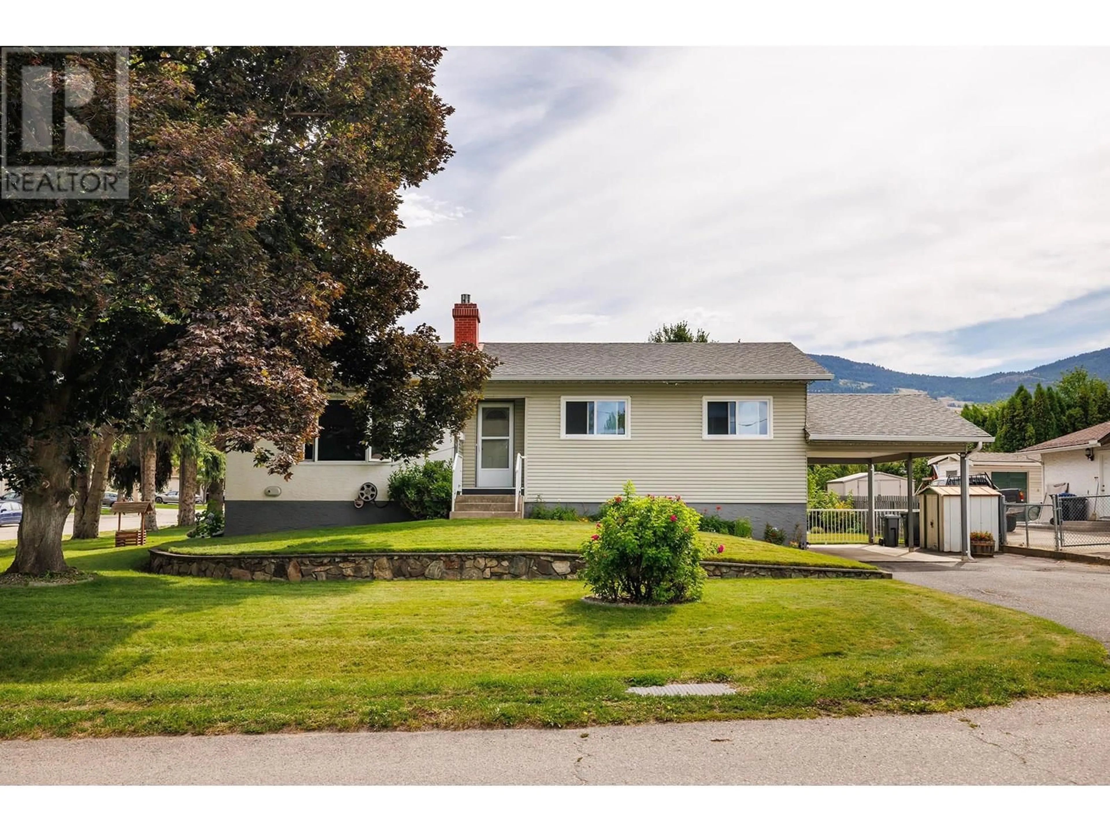 Home with vinyl exterior material, street for 1285 IRENE ROAD, Kelowna British Columbia V1X4Y1