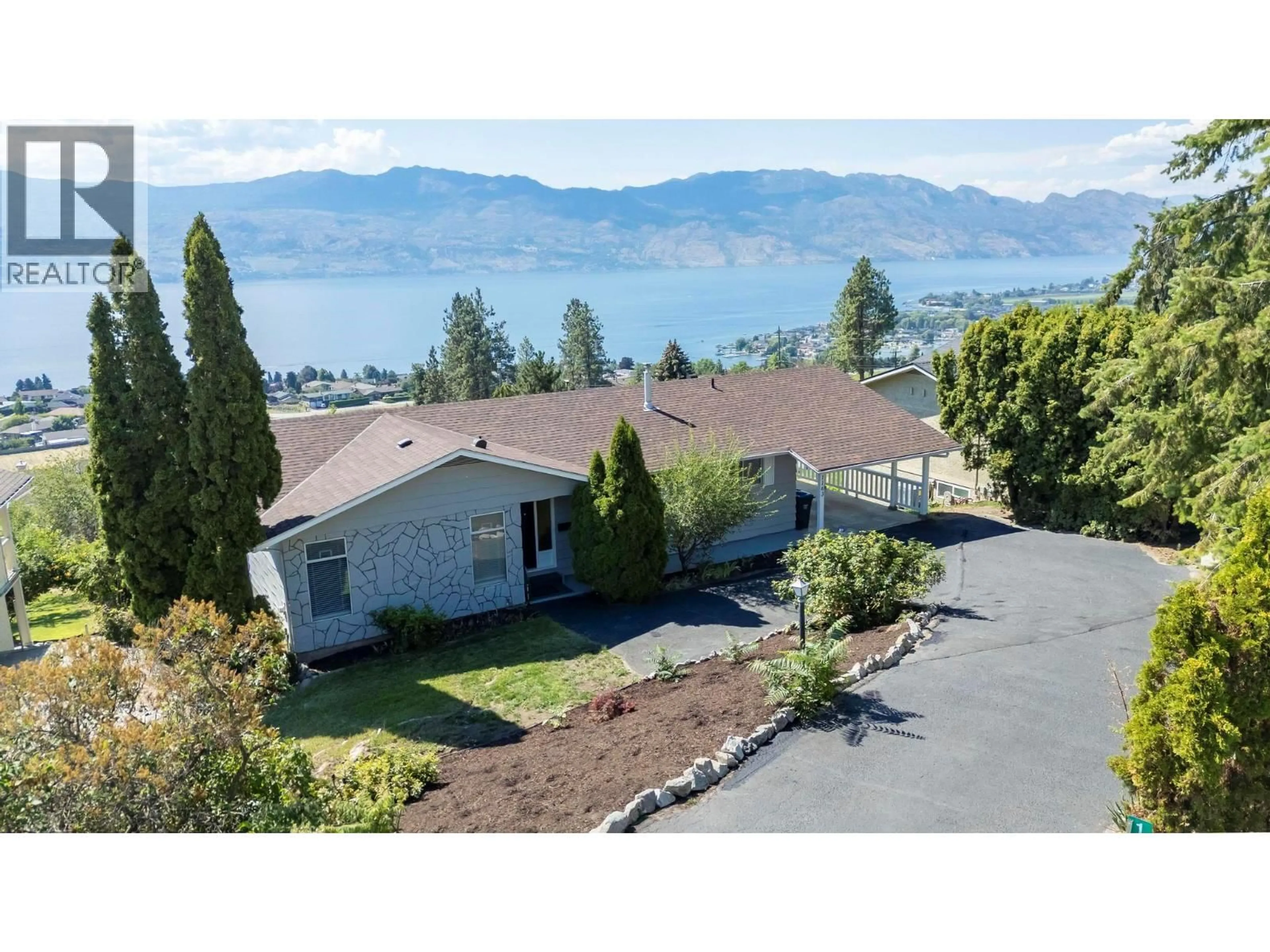 A pic from outside/outdoor area/front of a property/back of a property/a pic from drone, mountain view for 1163 MENU ROAD, West Kelowna British Columbia V1Z2J6