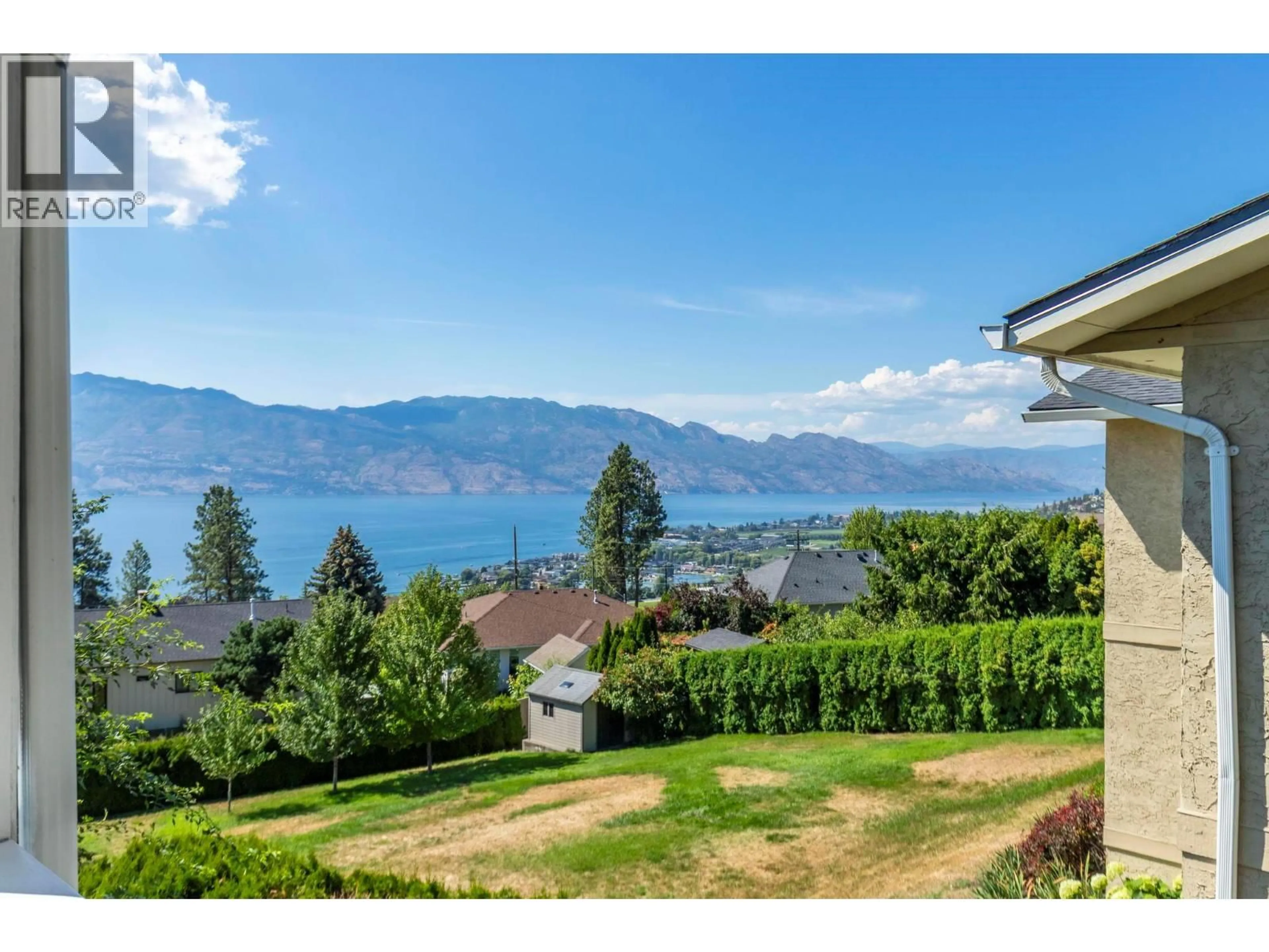 A pic from outside/outdoor area/front of a property/back of a property/a pic from drone, water/lake/river/ocean view for 1163 MENU ROAD, West Kelowna British Columbia V1Z2J6