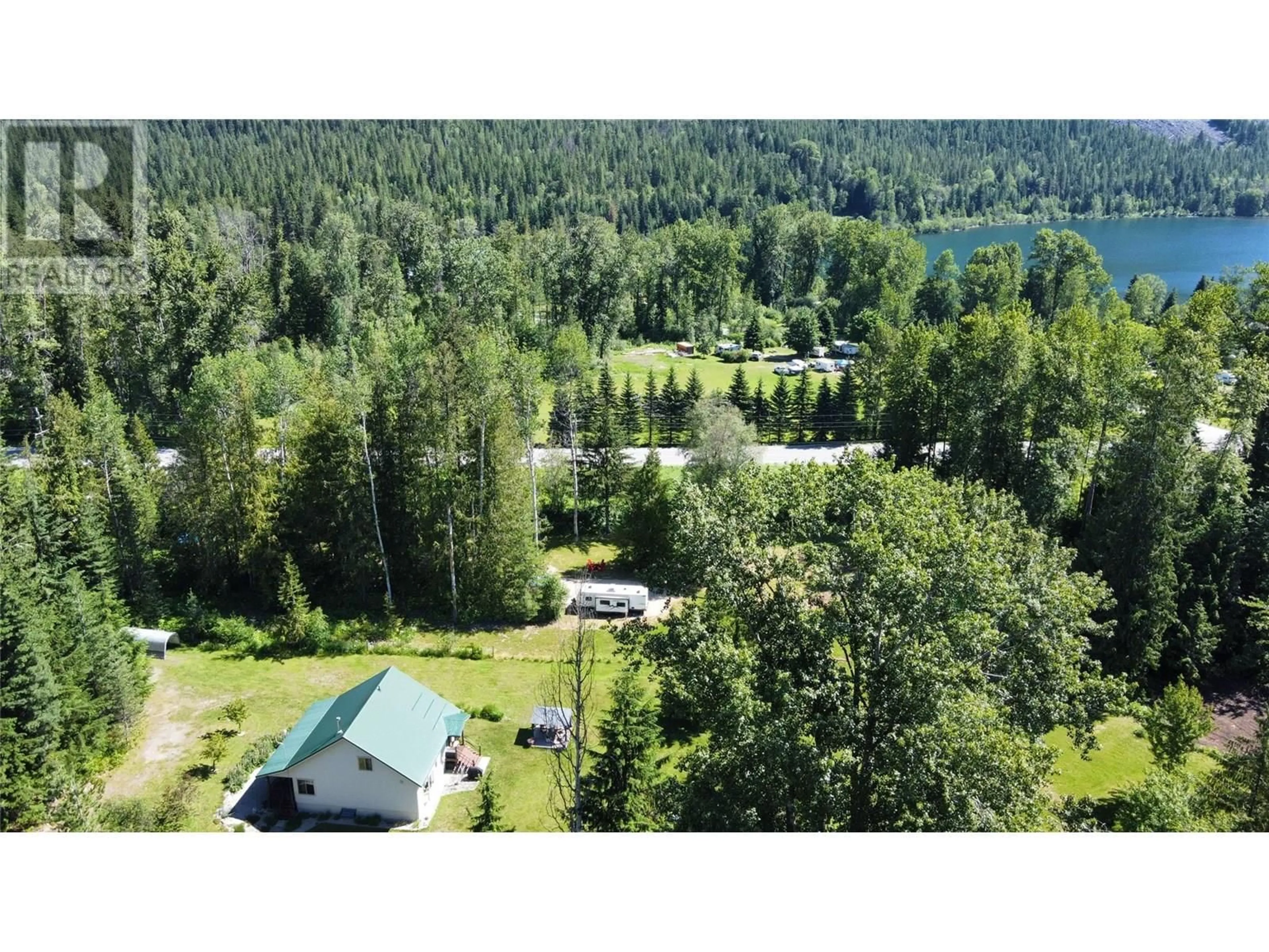 A pic from outside/outdoor area/front of a property/back of a property/a pic from drone, forest/trees view for 153 WILDWOOD ROAD, Summit Lake British Columbia V0G1R1