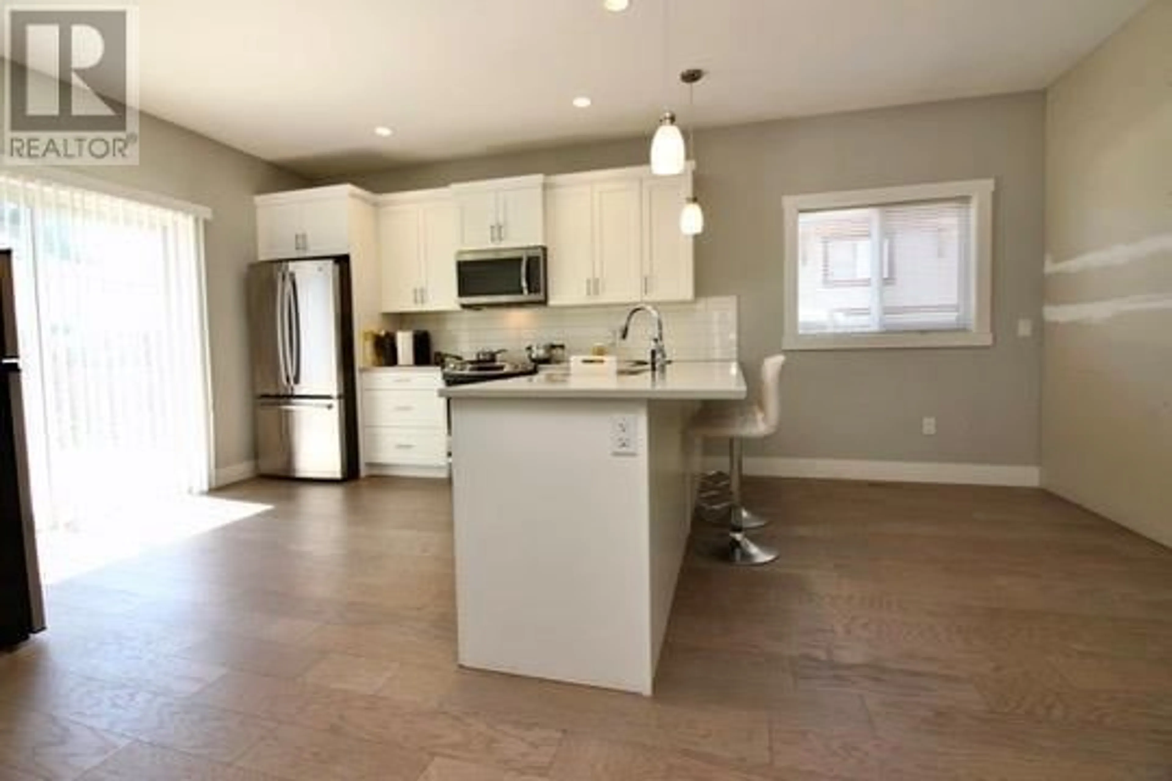 Open concept kitchen, ceramic/tile floor for 1480 INKAR ROAD, Kelowna British Columbia V1Y5W1