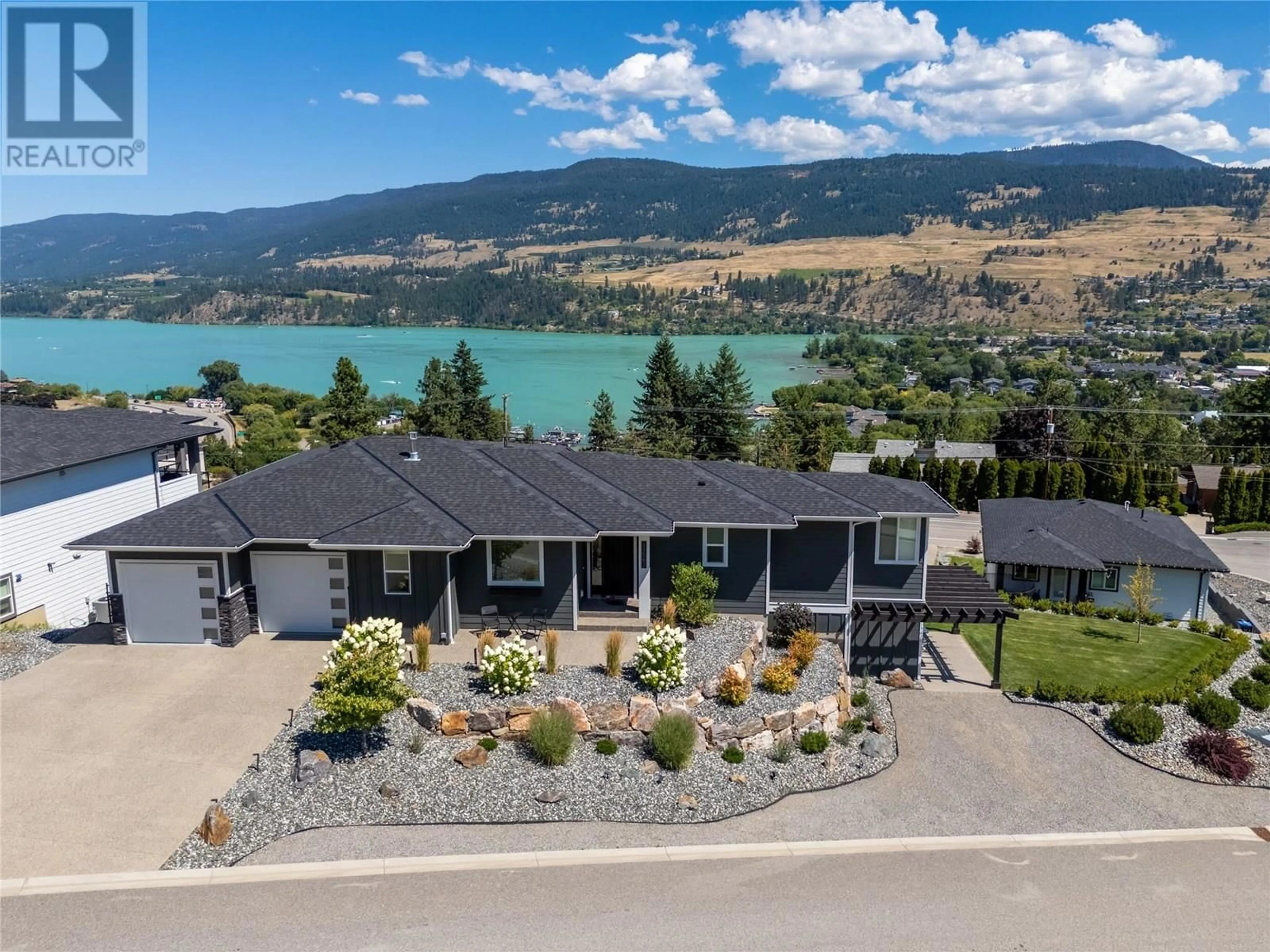 A pic from outside/outdoor area/front of a property/back of a property/a pic from drone, water/lake/river/ocean view for 11562 MIDDLETON ROAD SOUTH, Lake Country British Columbia V4V1G6
