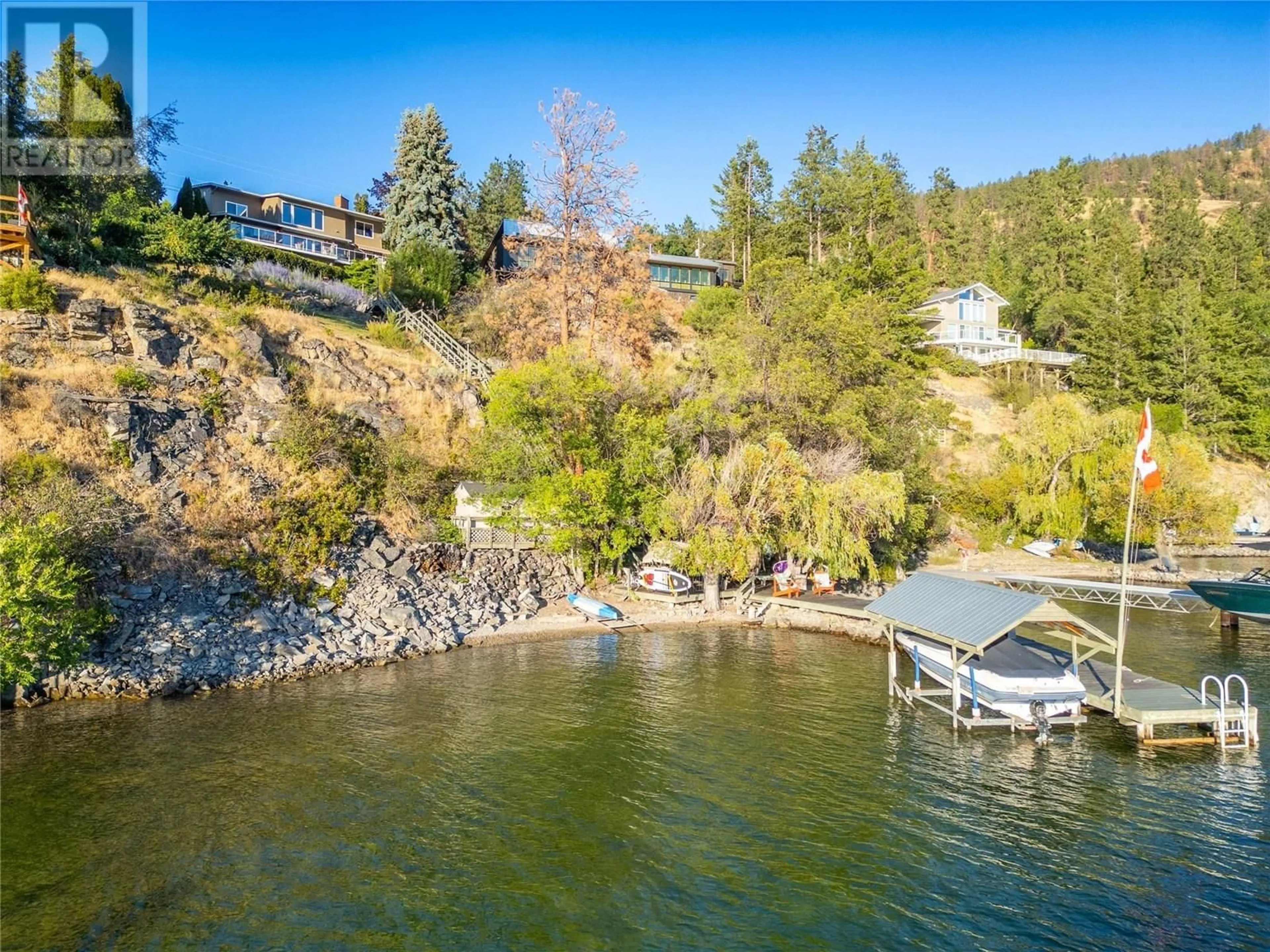A pic from outside/outdoor area/front of a property/back of a property/a pic from drone, water/lake/river/ocean view for 1988 DEWDNEY ROAD, Kelowna British Columbia V1V2C3
