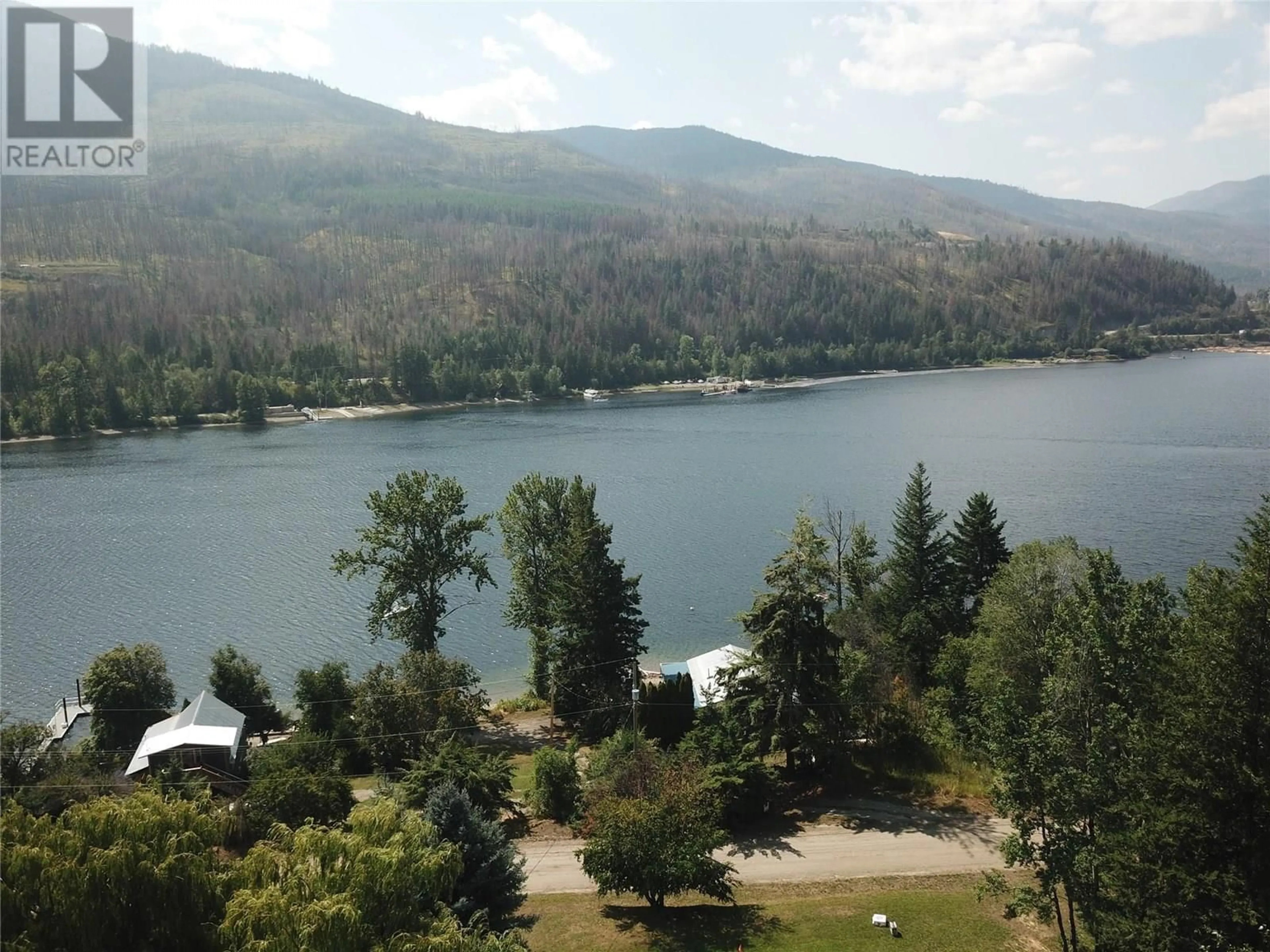 A pic from outside/outdoor area/front of a property/back of a property/a pic from drone, water/lake/river/ocean view for 2232 CHIEF ATAHM DRIVE, Adams Lake British Columbia V0E1M2