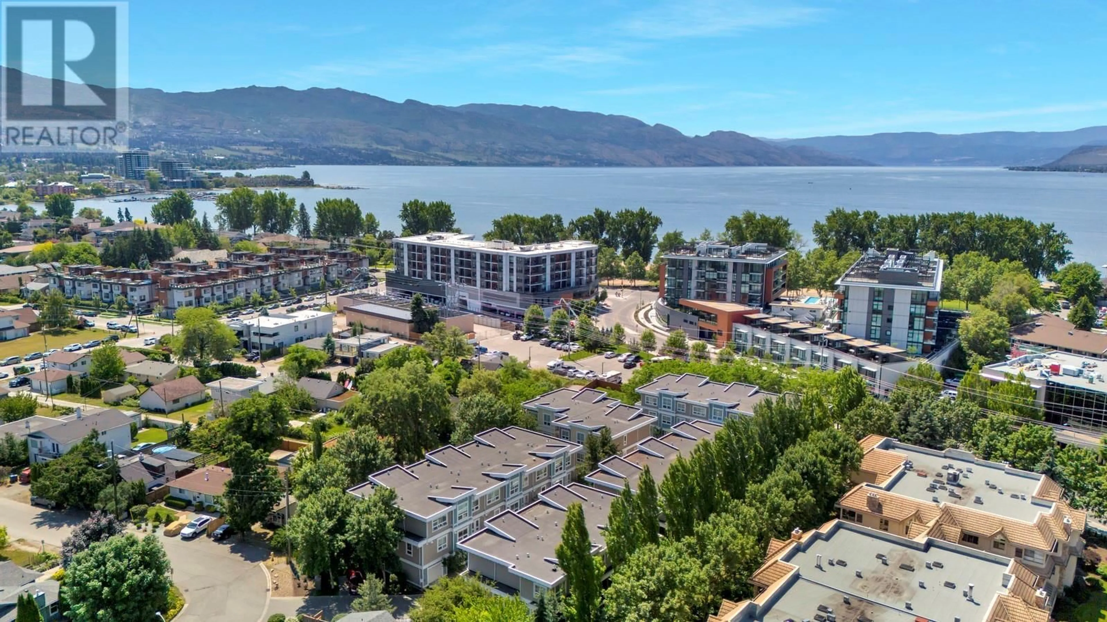 A pic from outside/outdoor area/front of a property/back of a property/a pic from drone, unknown for 8 - 3416 SCOTT ROAD, Kelowna British Columbia V1W3H3