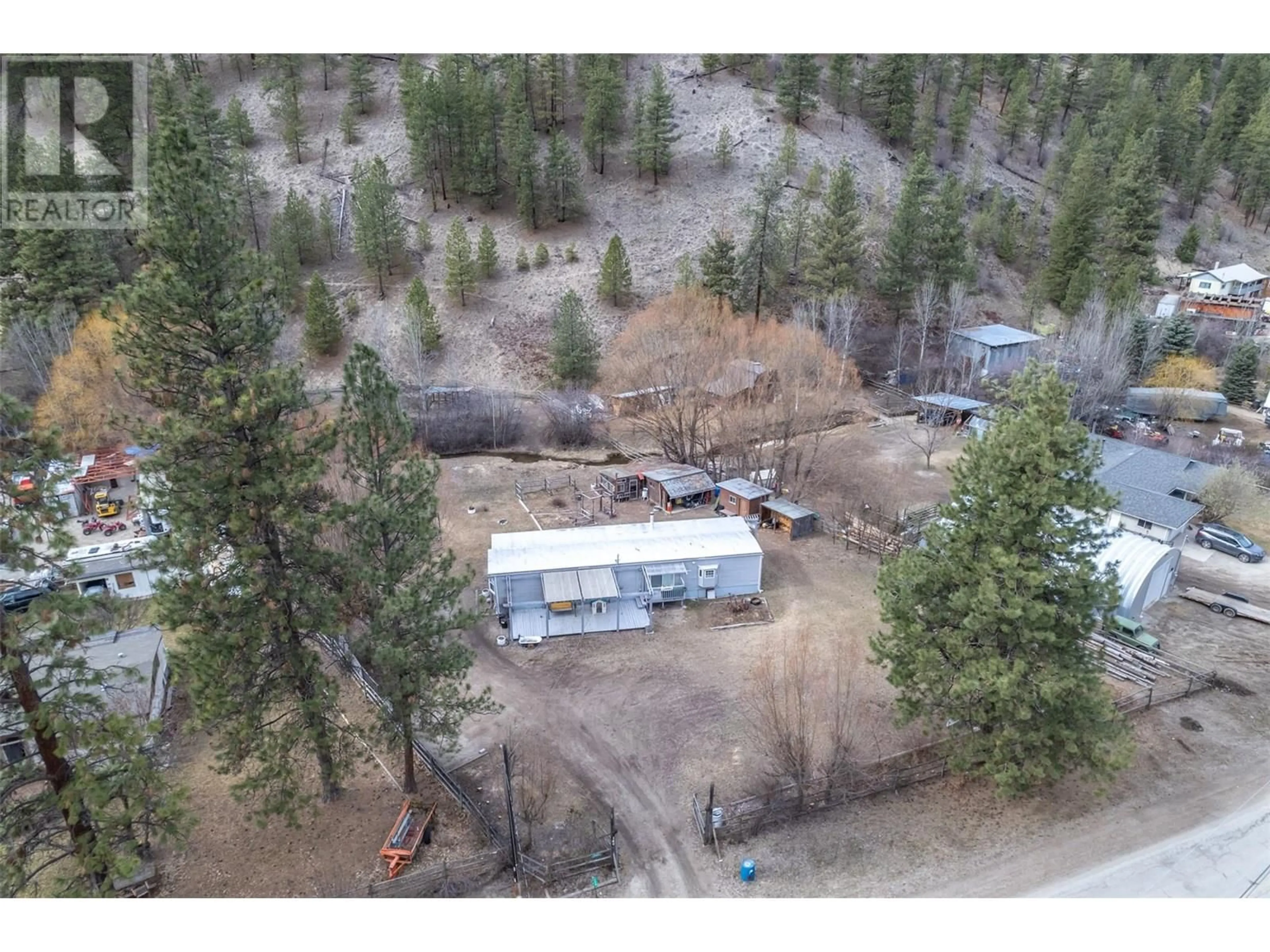 A pic from outside/outdoor area/front of a property/back of a property/a pic from drone, unknown for 140 FISH LAKE ROAD, Summerland British Columbia V0H1Z8