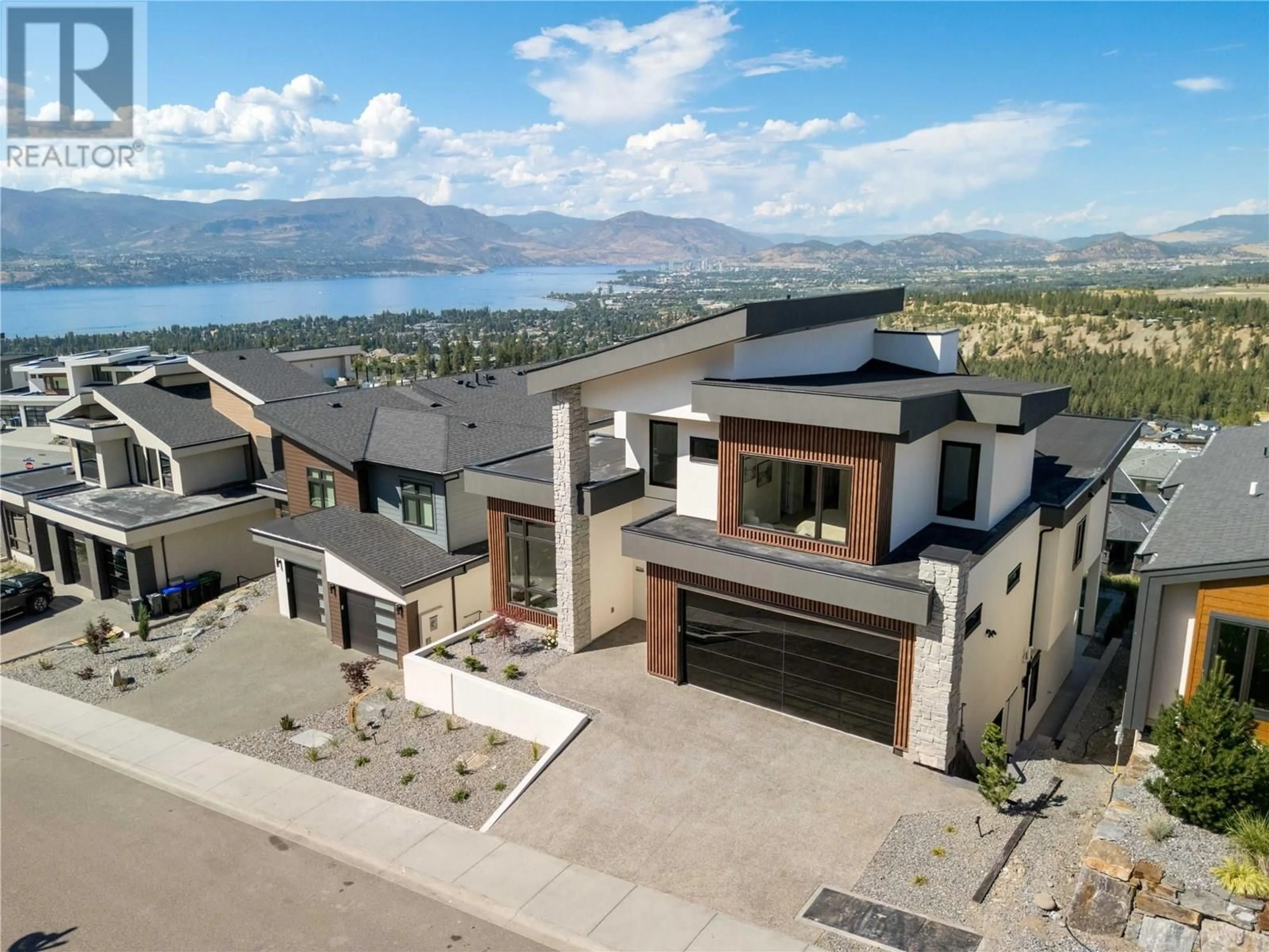 A pic from outside/outdoor area/front of a property/back of a property/a pic from drone, mountain view for 1016 EMSLIE STREET, Kelowna British Columbia V1W0C3