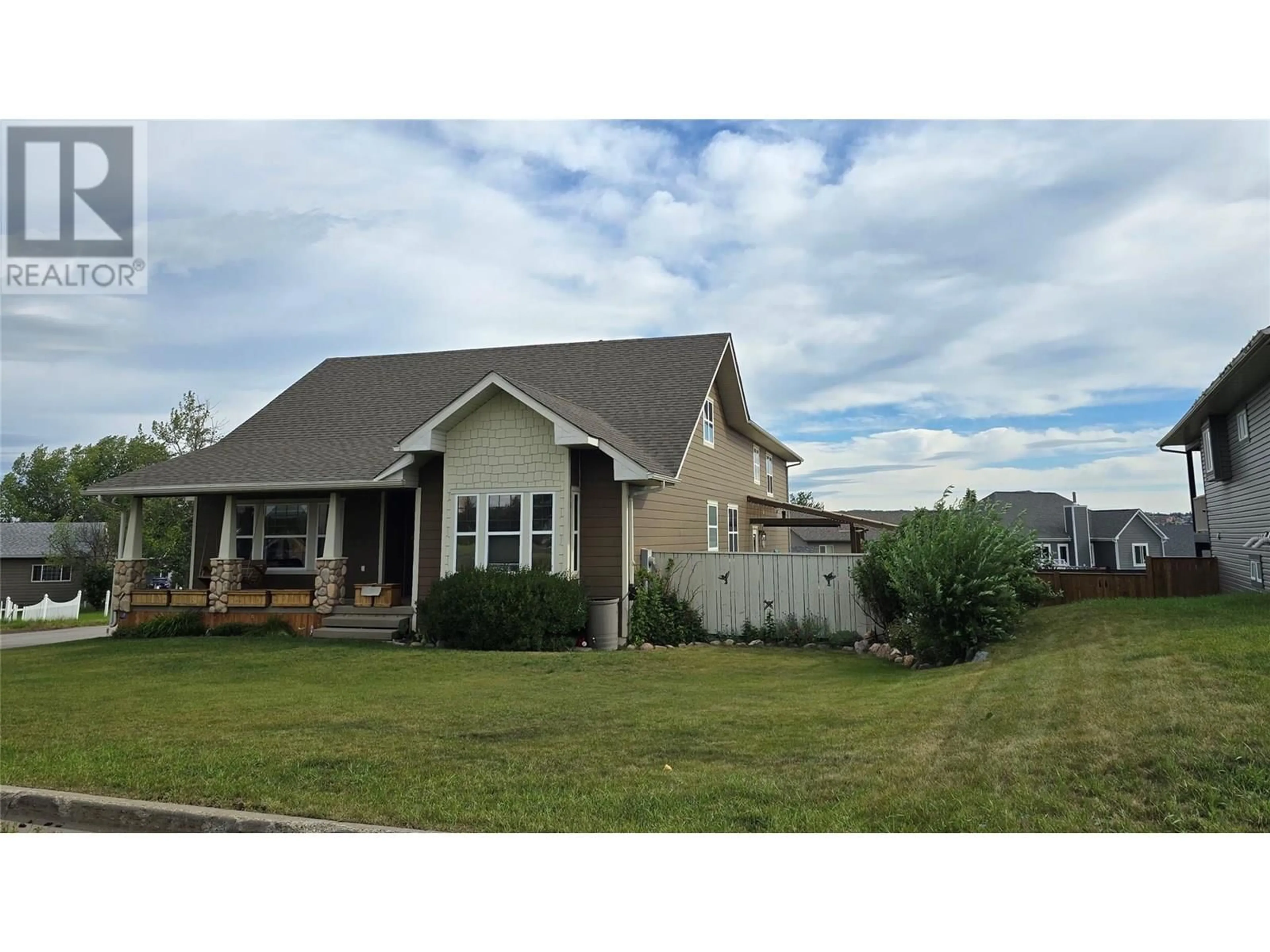 Home with vinyl exterior material, street for 1820 110 AVENUE, Dawson Creek British Columbia V1G0A3