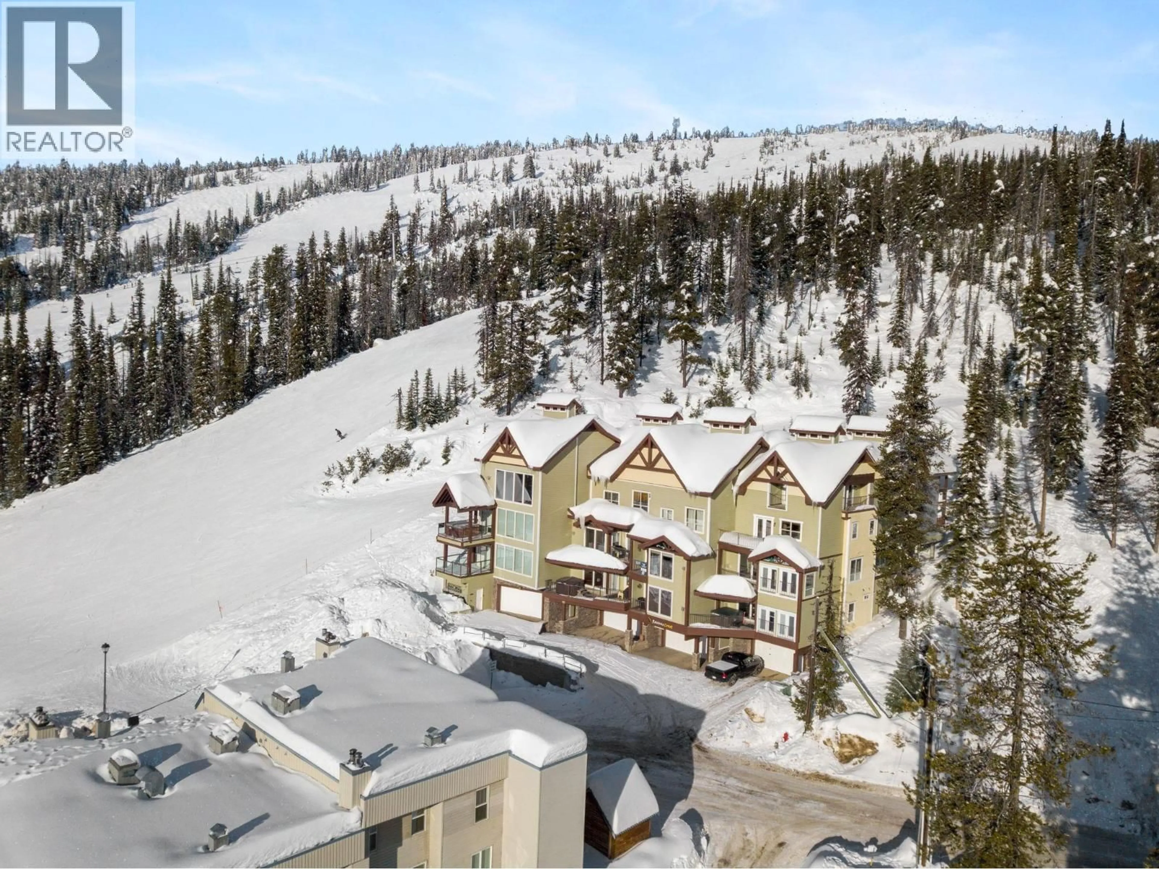 A pic from outside/outdoor area/front of a property/back of a property/a pic from drone, mountain view for 6 - 7360 PORCUPINE ROAD, Big White British Columbia V1P1P3