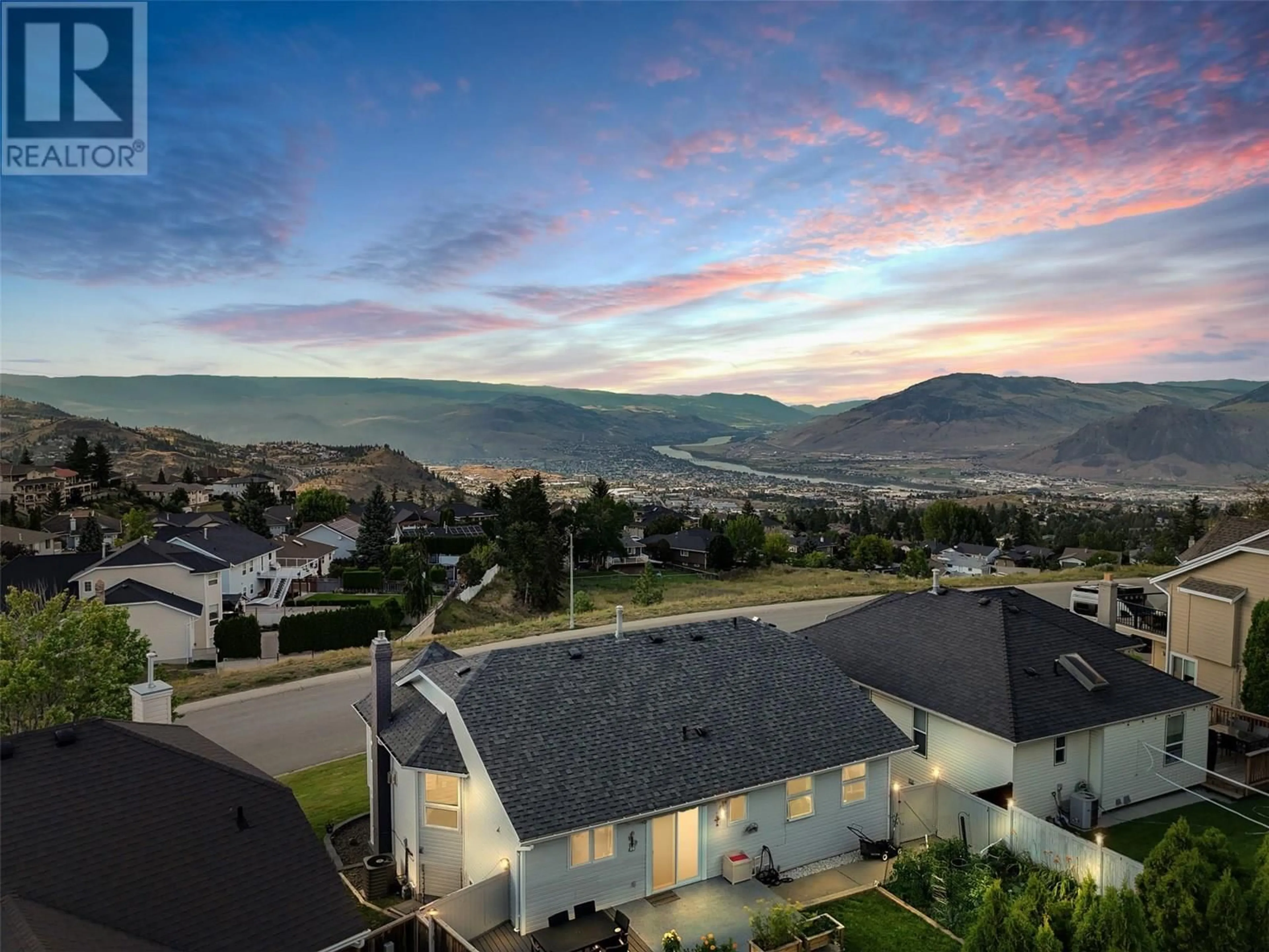 A pic from outside/outdoor area/front of a property/back of a property/a pic from drone, mountain view for 2271 GARYMEDE DRIVE DRIVE, Kamloops British Columbia V1S1P3