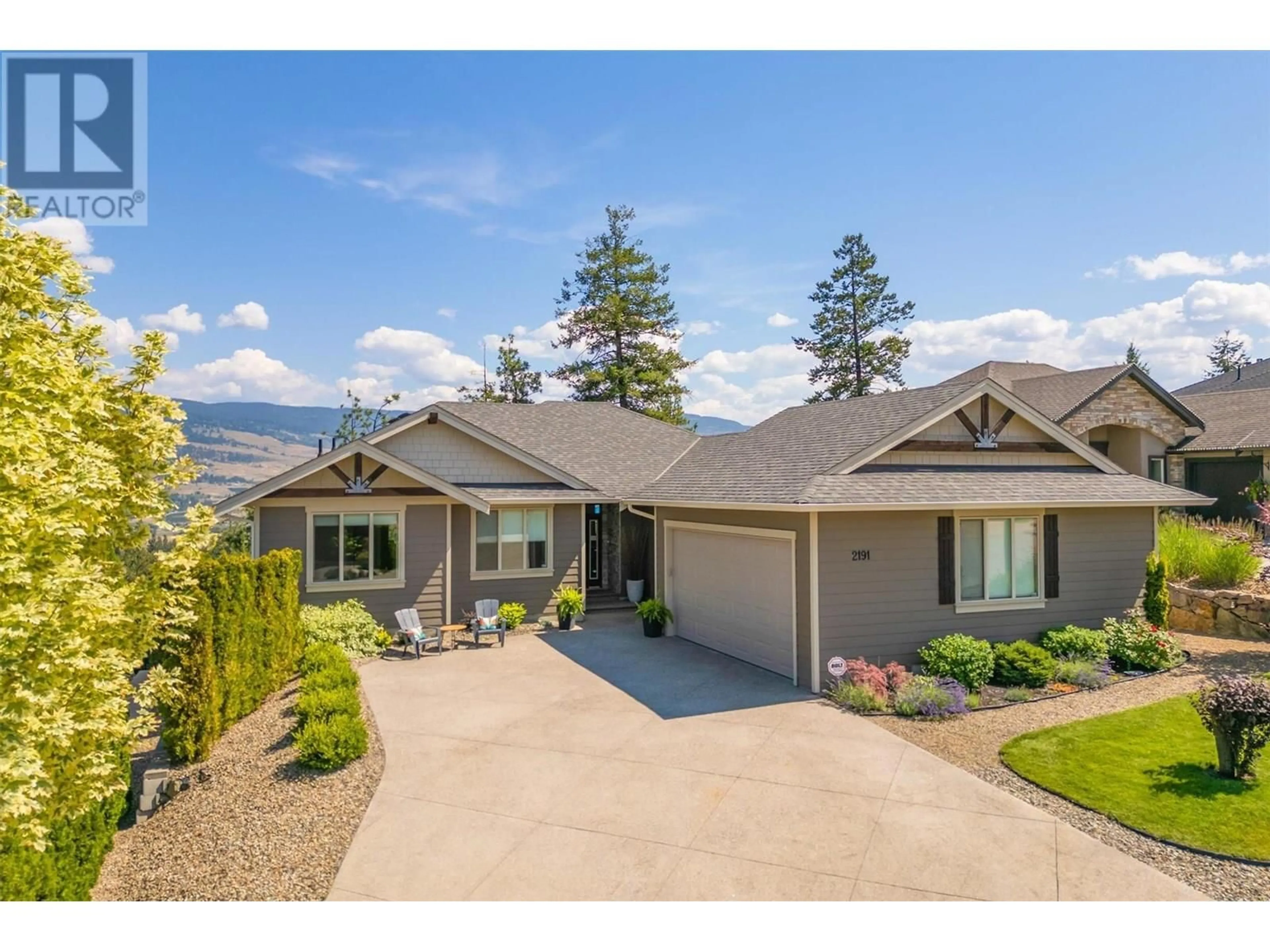 A pic from outside/outdoor area/front of a property/back of a property/a pic from drone, mountain view for 2191 SALERNO COURT, Kelowna British Columbia V1V2S4