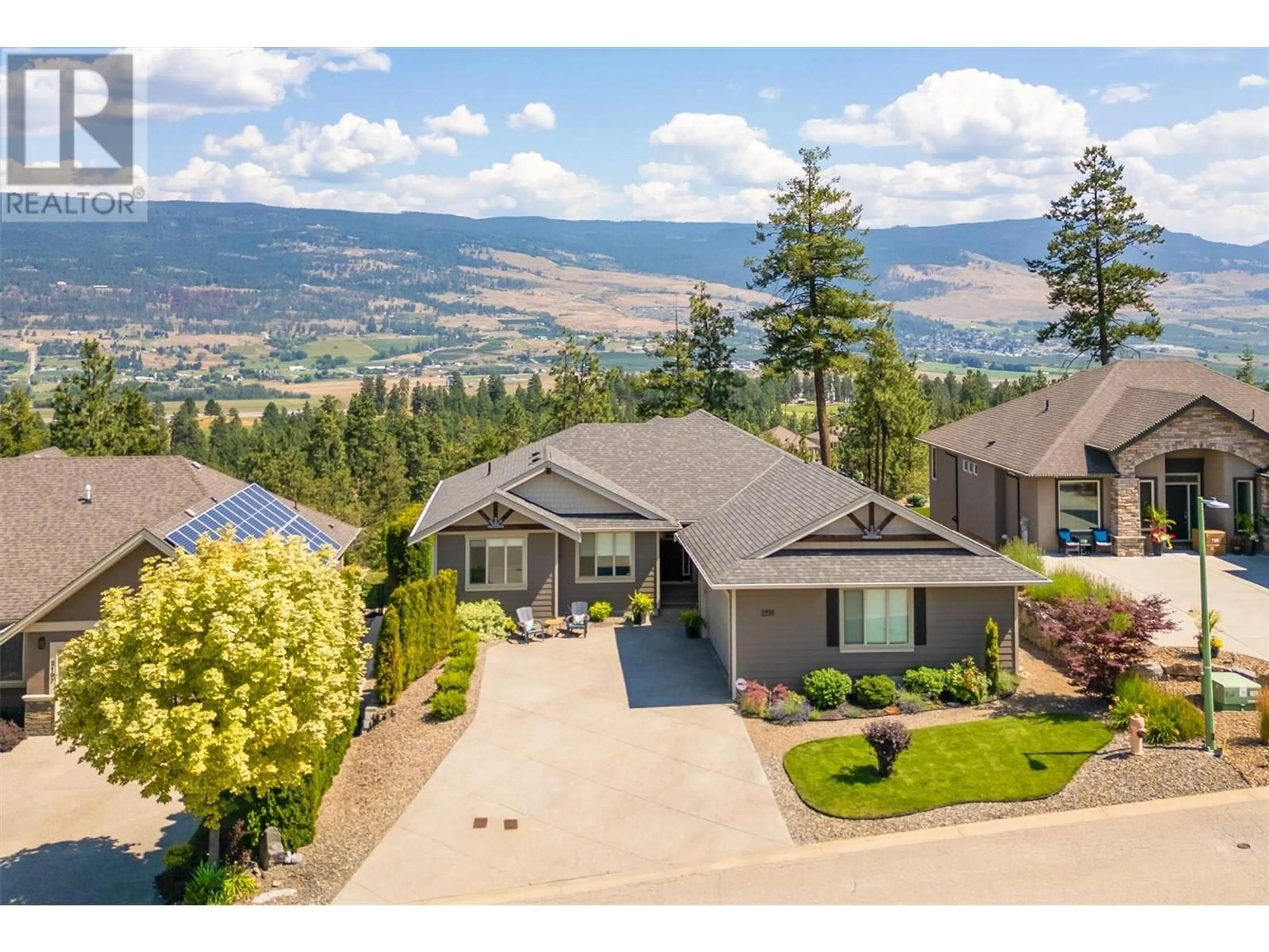 A pic from outside/outdoor area/front of a property/back of a property/a pic from drone, mountain view for 2191 SALERNO COURT, Kelowna British Columbia V1V2S4