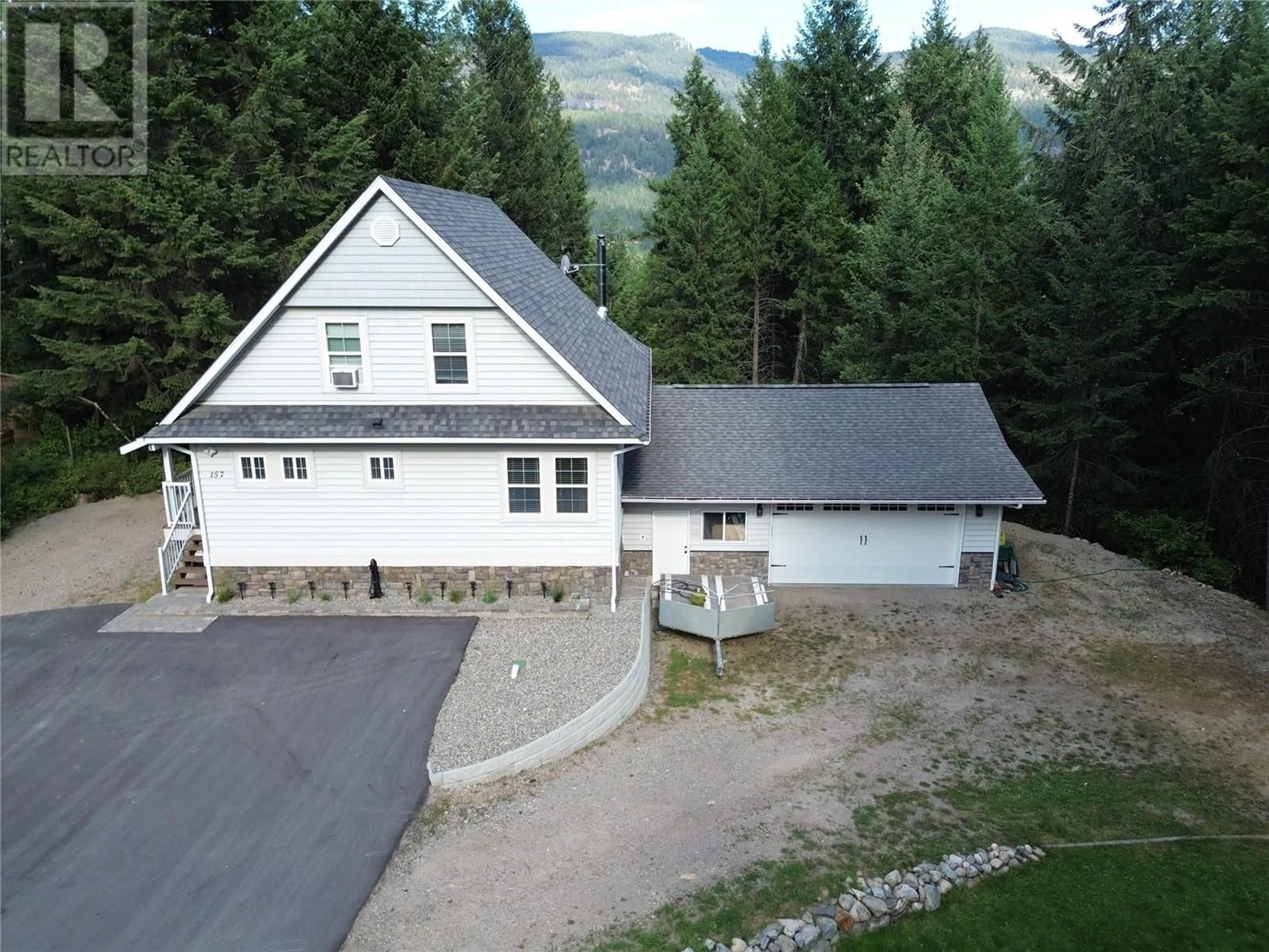 A pic from outside/outdoor area/front of a property/back of a property/a pic from drone, mountain view for 157 CHASE ROAD, Christina Lake British Columbia V0H1E0