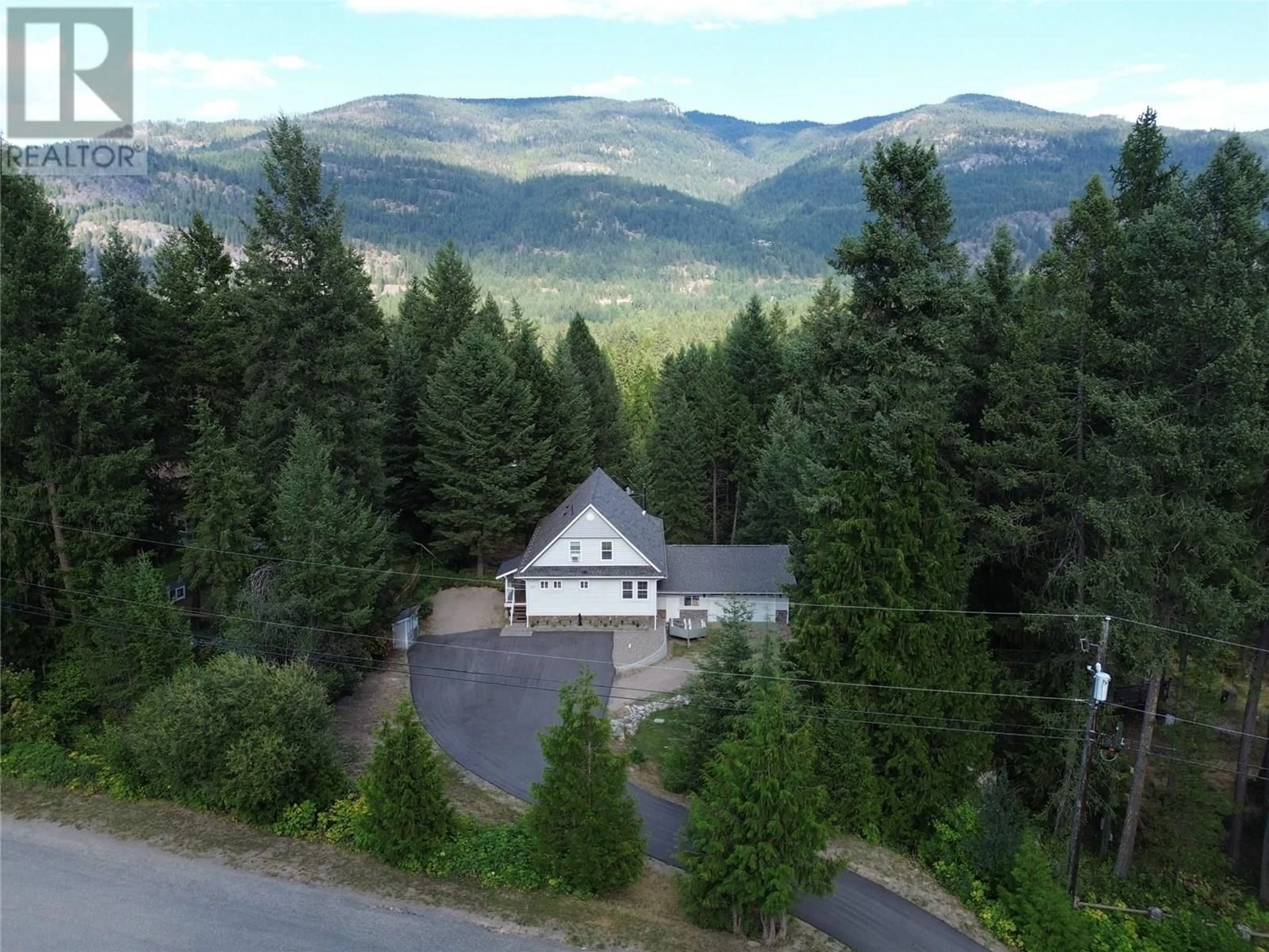 A pic from outside/outdoor area/front of a property/back of a property/a pic from drone, mountain view for 157 CHASE ROAD, Christina Lake British Columbia V0H1E0