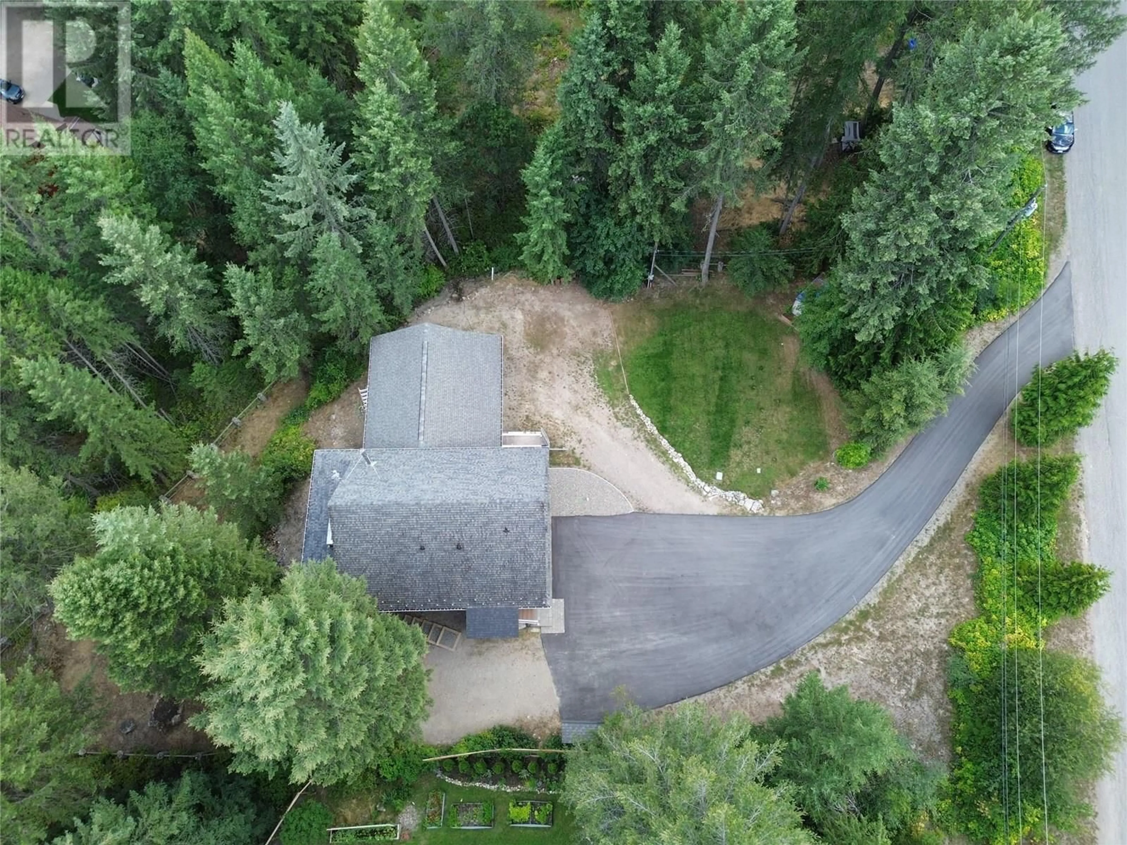 A pic from outside/outdoor area/front of a property/back of a property/a pic from drone, forest/trees view for 157 CHASE ROAD, Christina Lake British Columbia V0H1E0