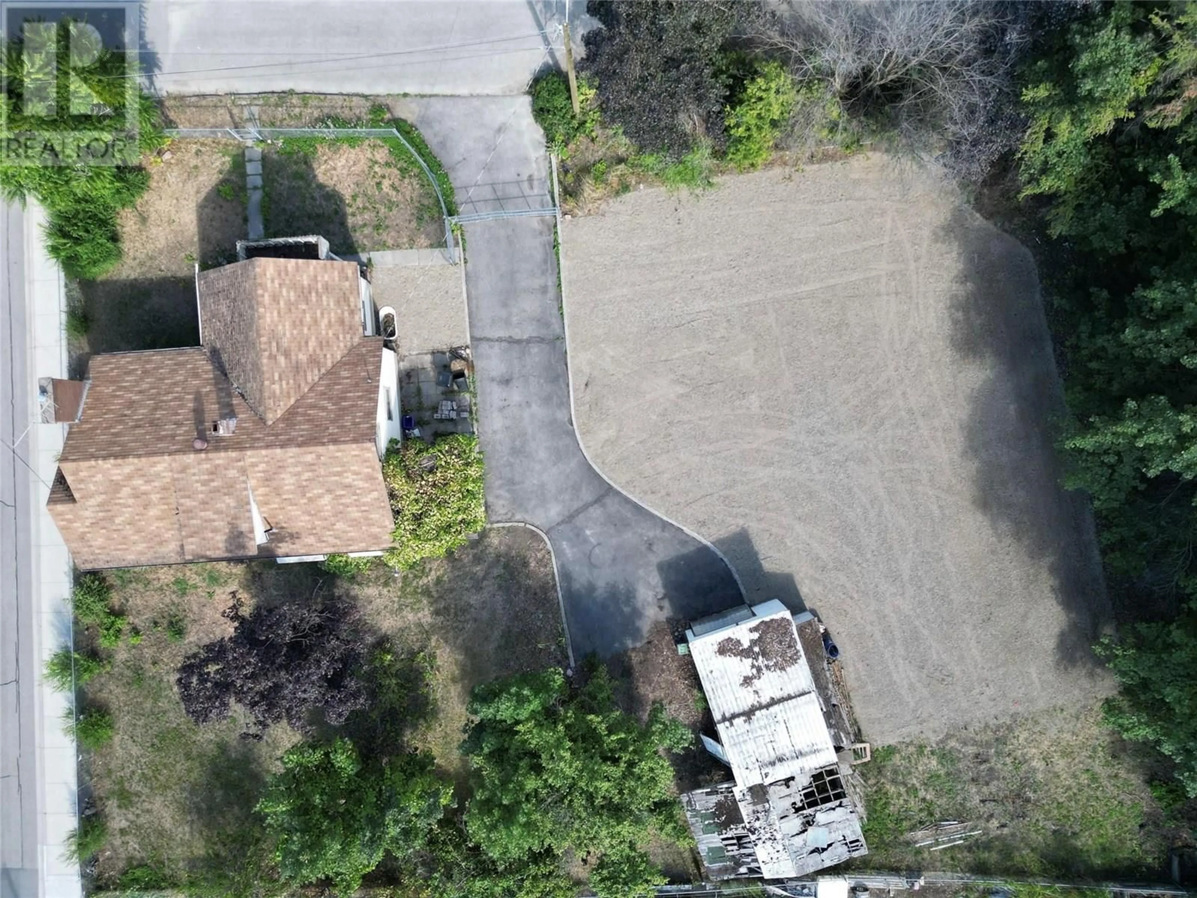 A pic from outside/outdoor area/front of a property/back of a property/a pic from drone, street for 2310 34A STREET, Vernon British Columbia V1T5Z8