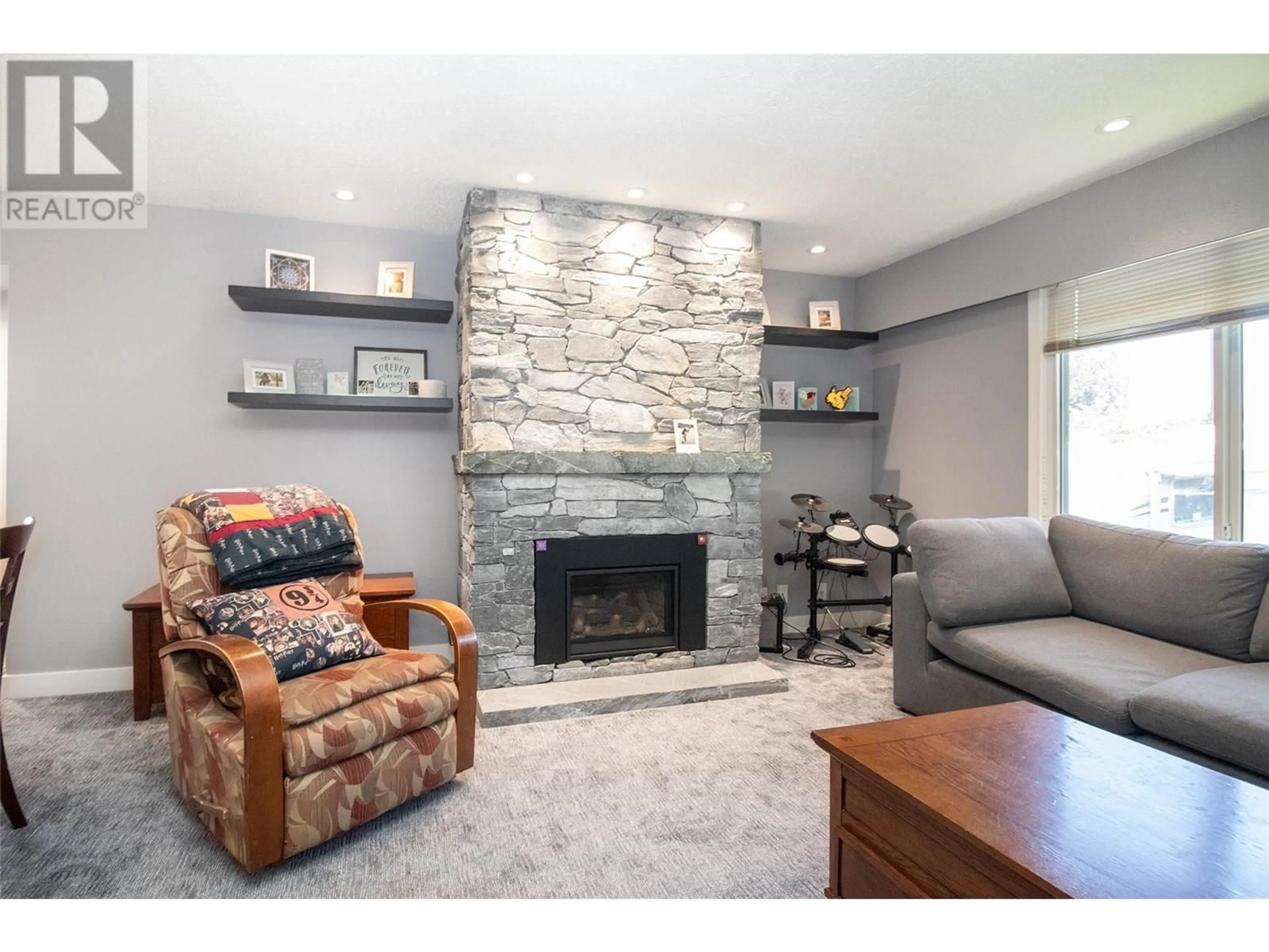 Living room with furniture, unknown for 3532 BARNEY ROAD, Kelowna British Columbia V4T1J2