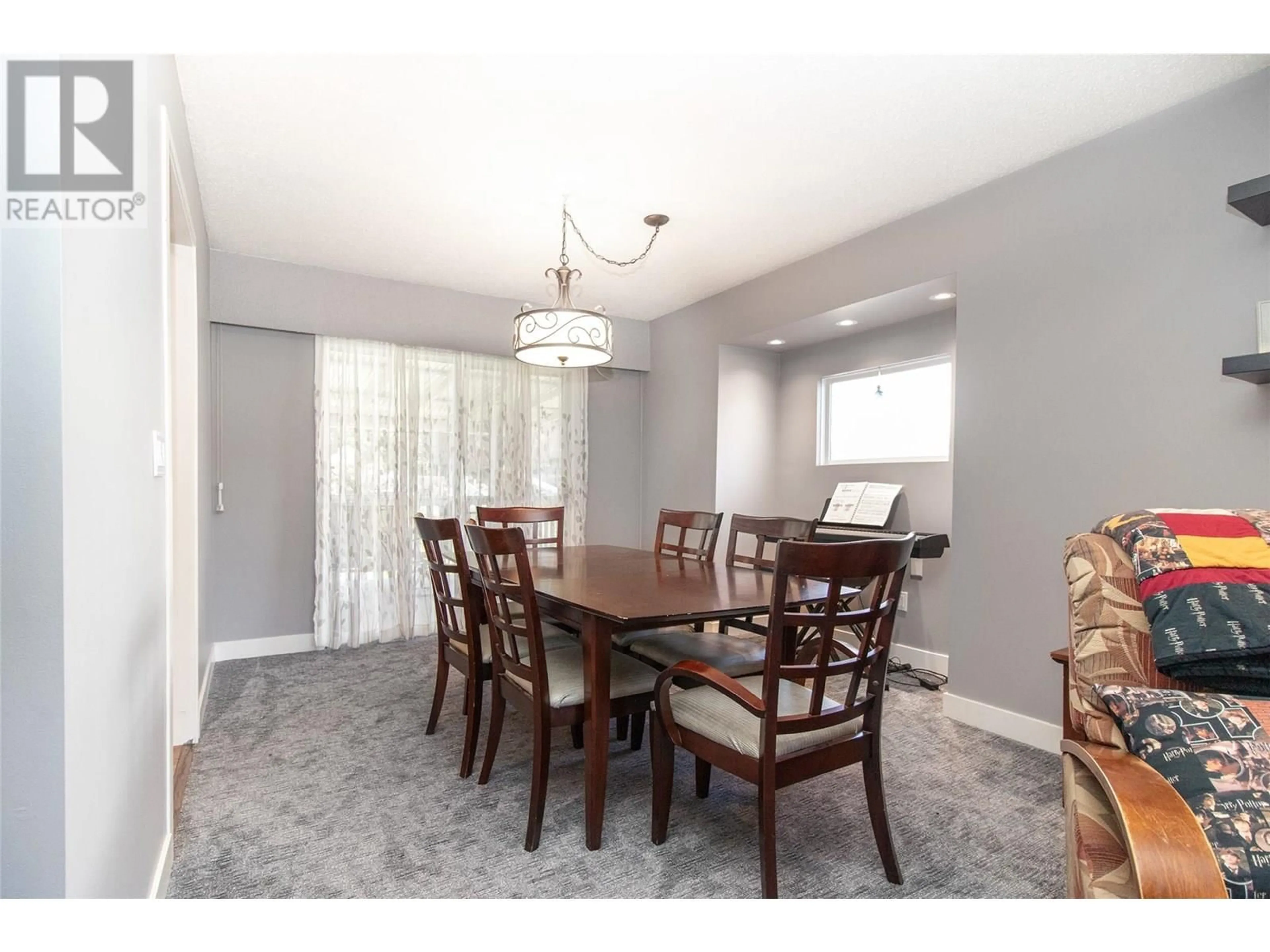 Dining room, wood/laminate floor for 3532 BARNEY ROAD, Kelowna British Columbia V4T1J2