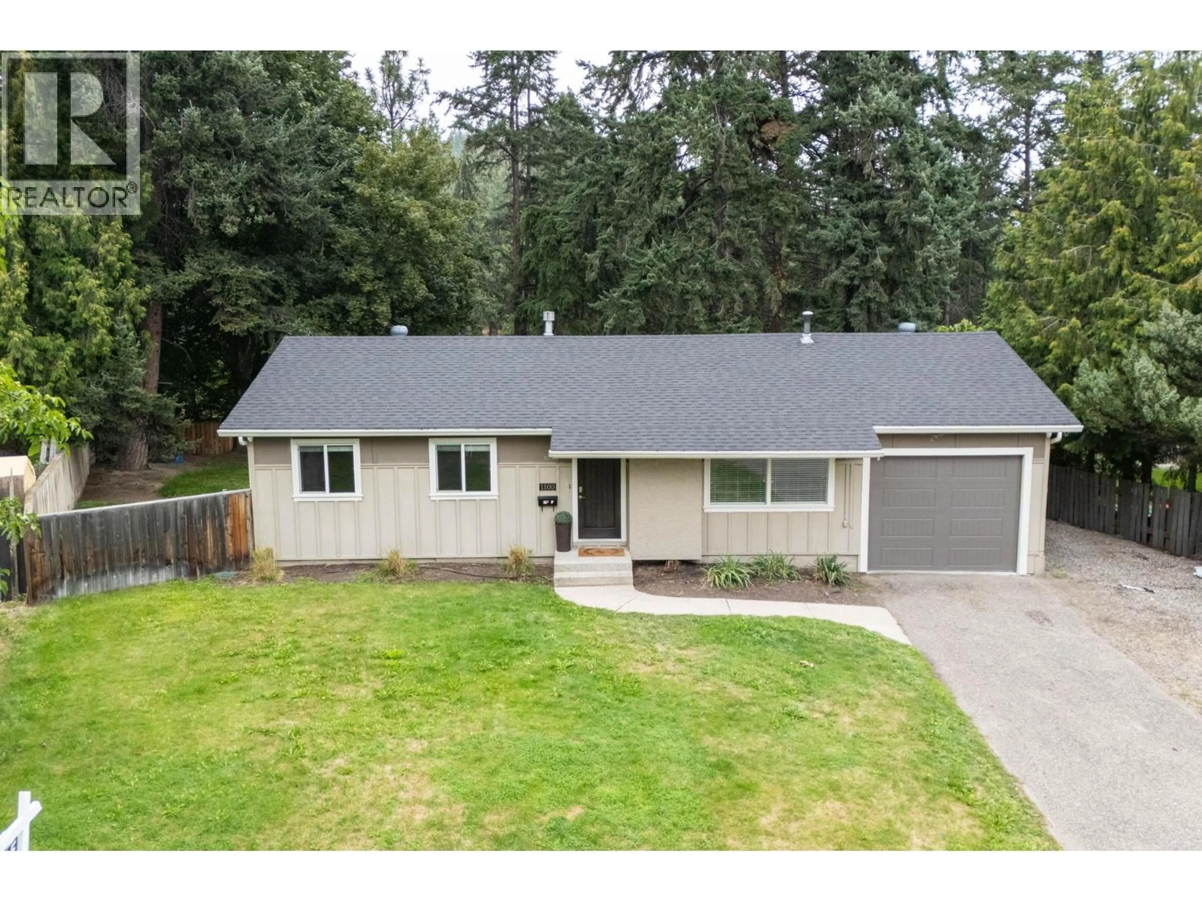 A pic from outside/outdoor area/front of a property/back of a property/a pic from drone, street for 1100 SUSSEX ROAD, West Kelowna British Columbia V1Z1B5