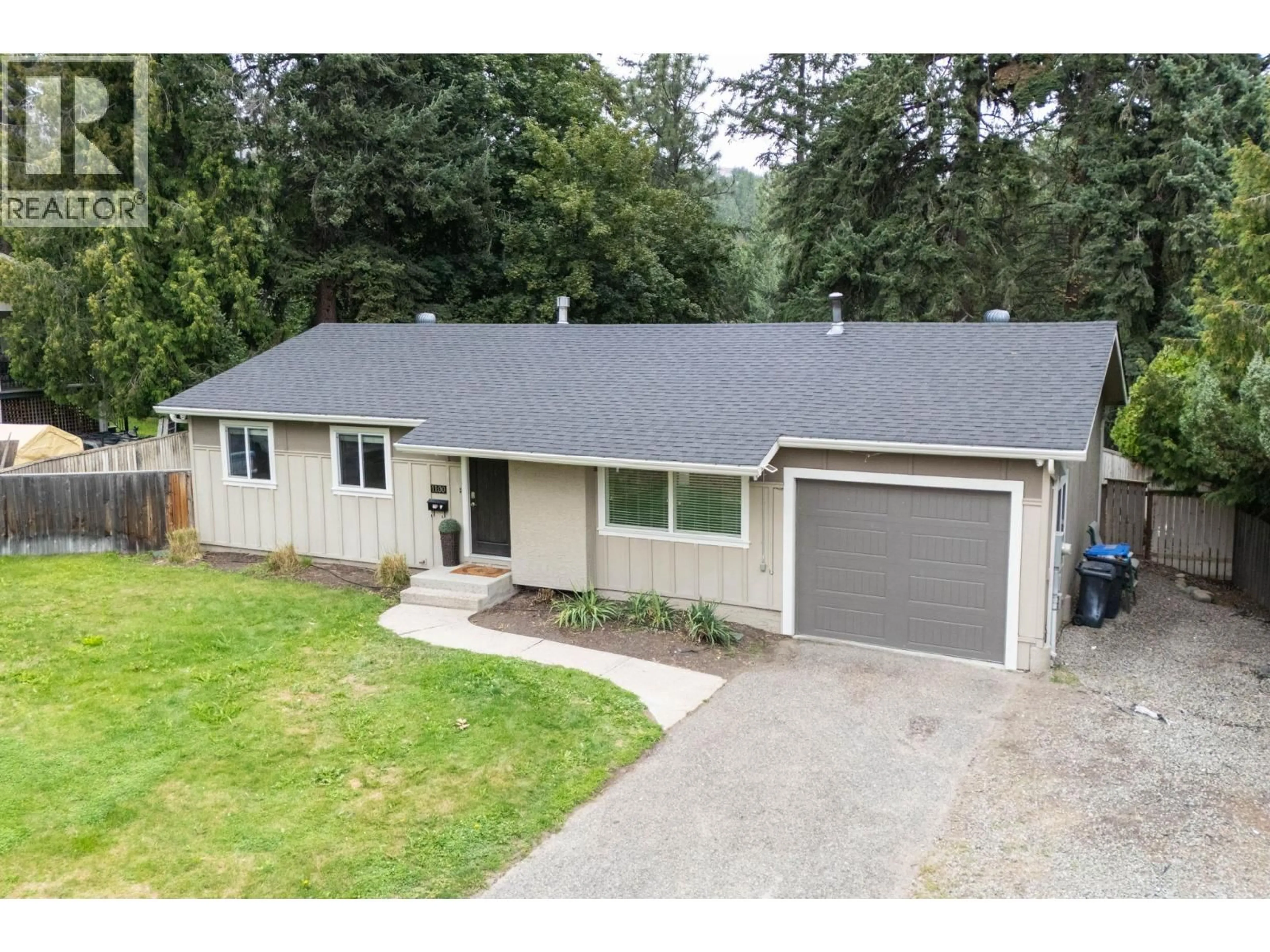 A pic from outside/outdoor area/front of a property/back of a property/a pic from drone, street for 1100 SUSSEX ROAD, West Kelowna British Columbia V1Z1B5