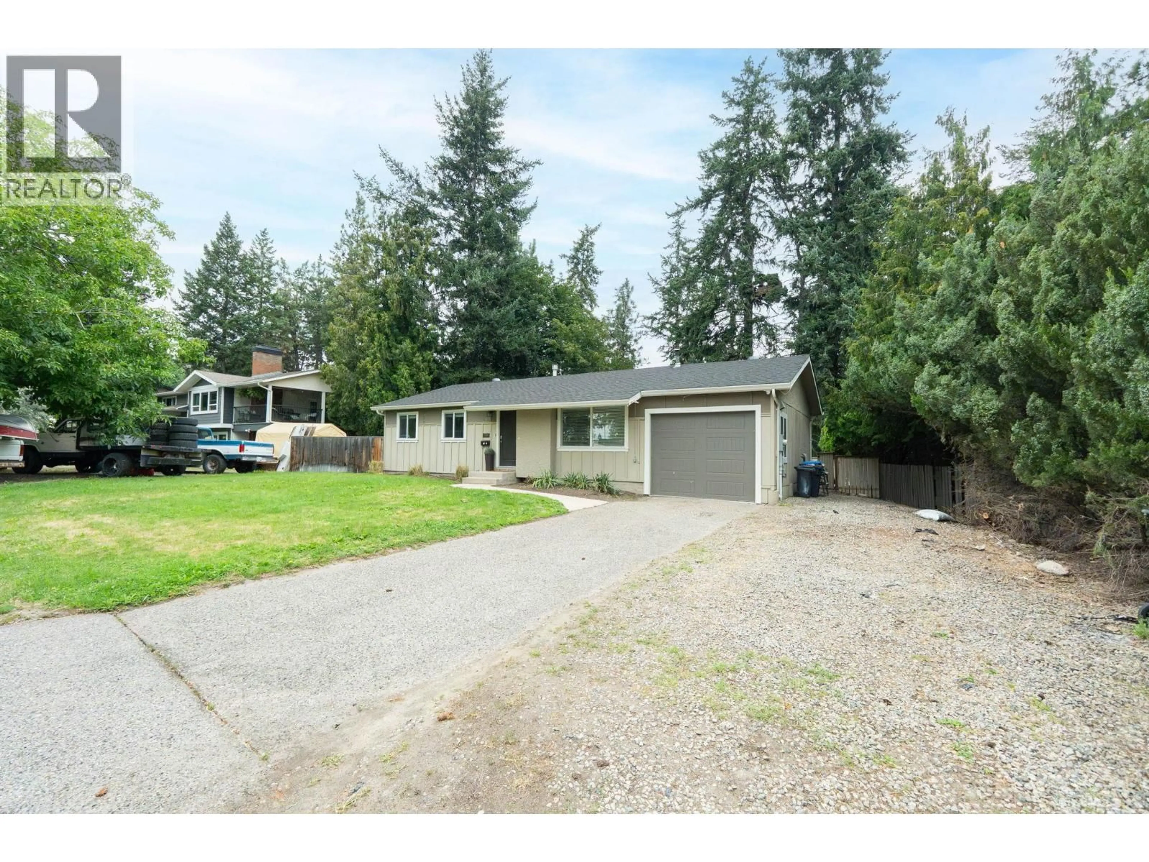 A pic from outside/outdoor area/front of a property/back of a property/a pic from drone, street for 1100 SUSSEX ROAD, West Kelowna British Columbia V1Z1B5