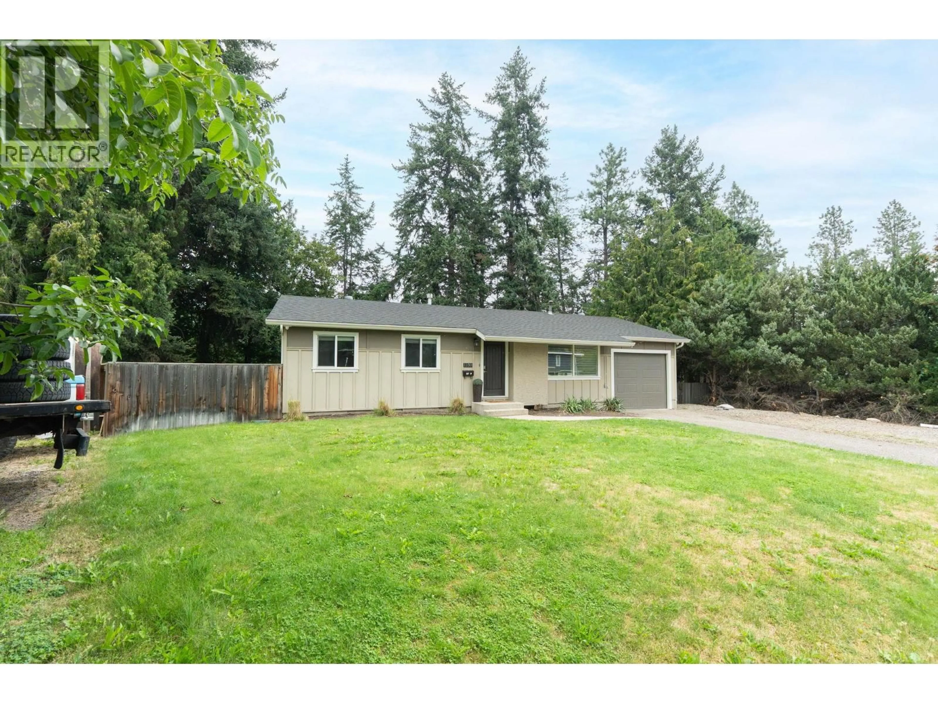 Home with vinyl exterior material, street for 1100 SUSSEX ROAD, West Kelowna British Columbia V1Z1B5