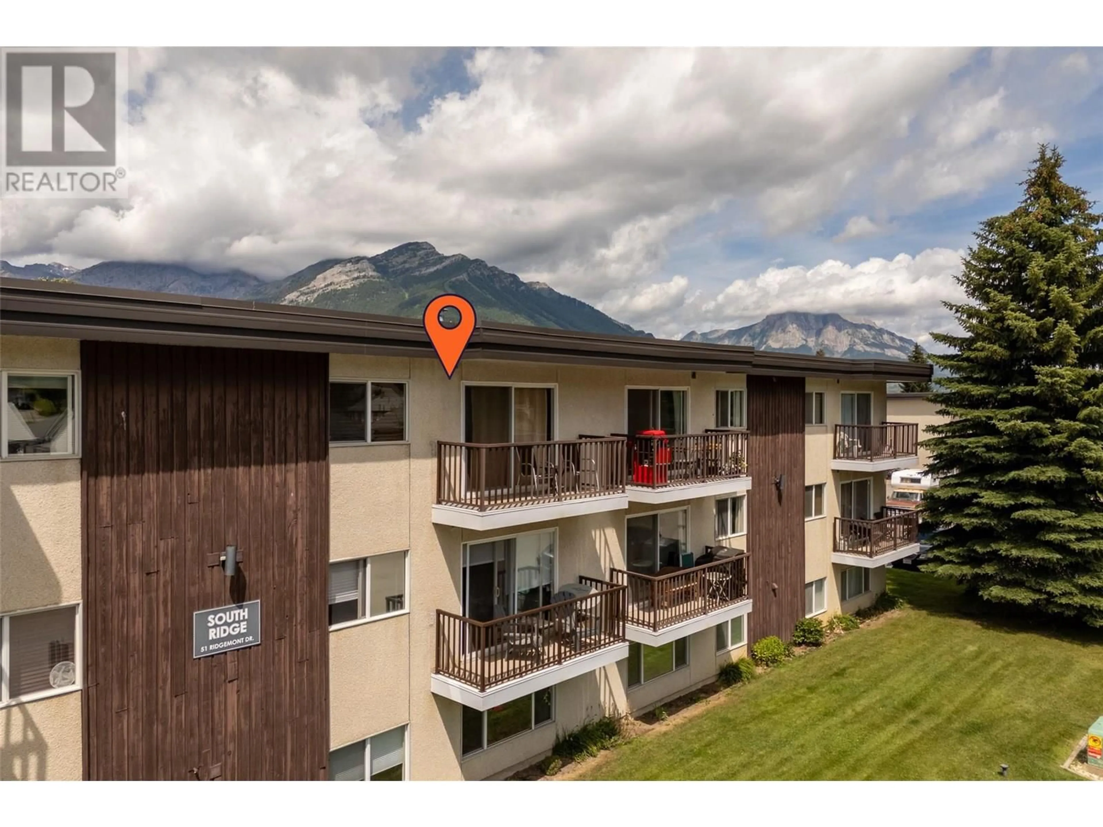 A pic from outside/outdoor area/front of a property/back of a property/a pic from drone, mountain view for 306 - 51 RIDGEMONT DRIVE, Fernie British Columbia V0B1M2