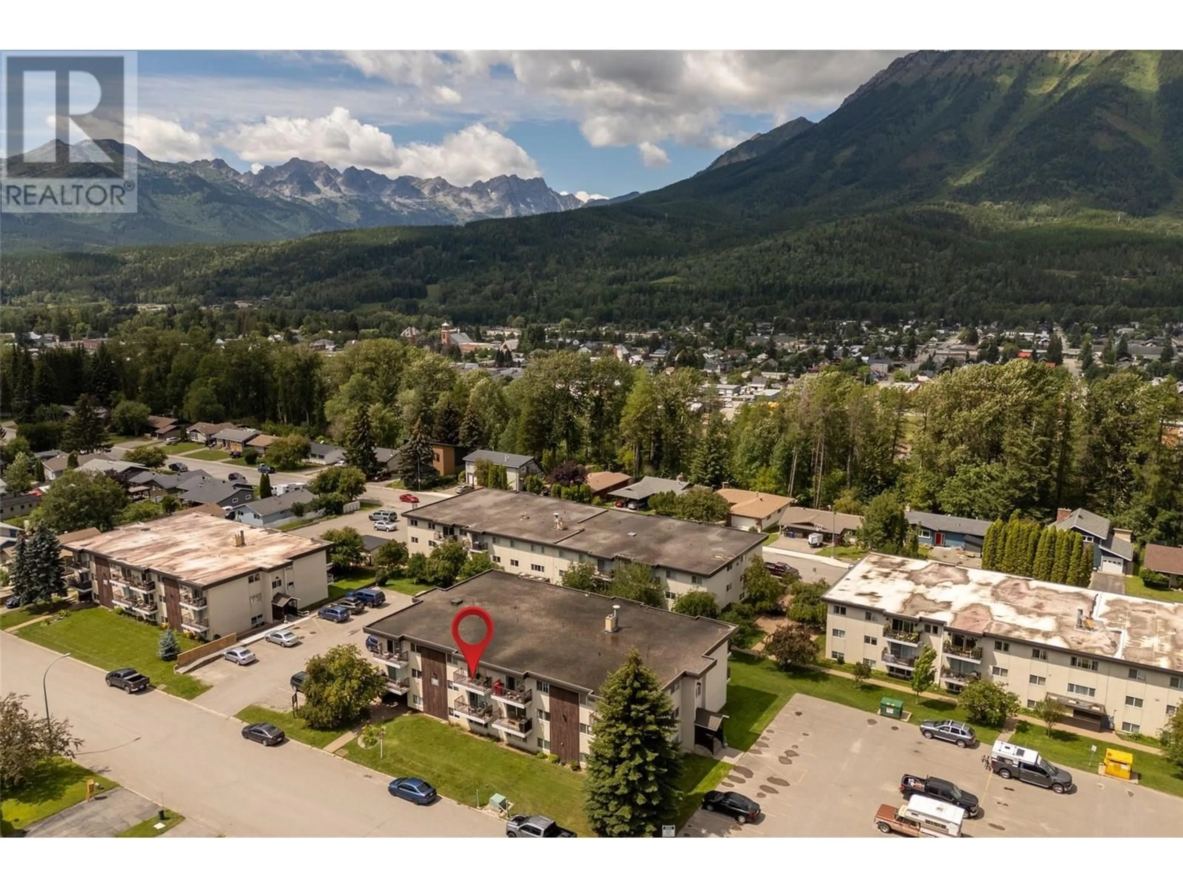 A pic from outside/outdoor area/front of a property/back of a property/a pic from drone, mountain view for 306 - 51 RIDGEMONT DRIVE, Fernie British Columbia V0B1M2